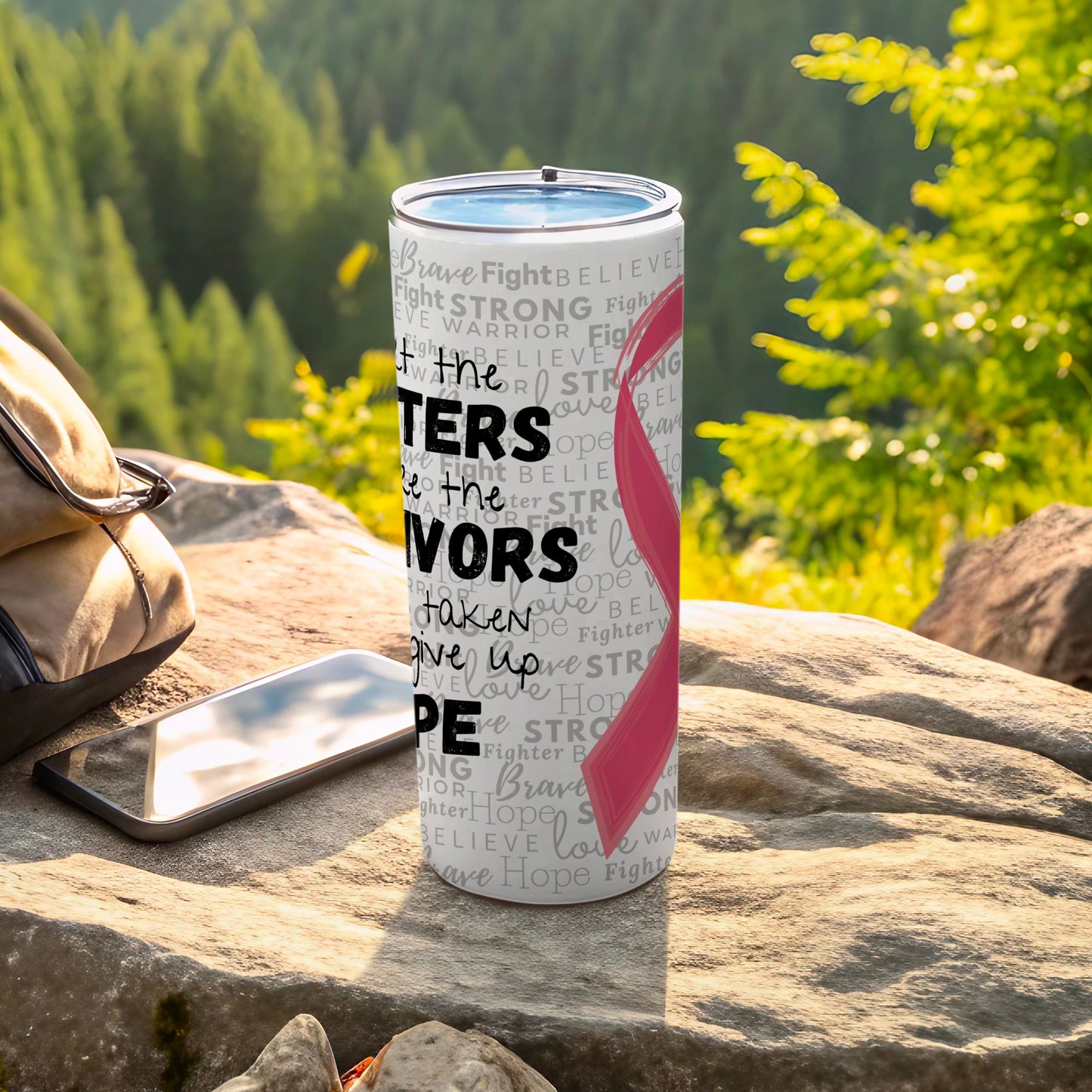 Tumbler with bold text "FIGHTER" and a pink ribbon.