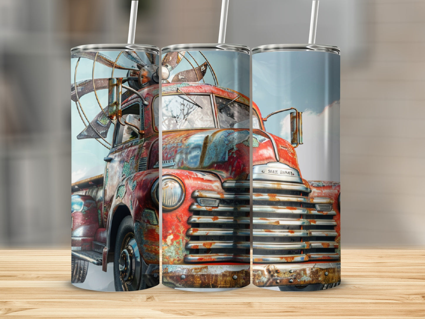 Rusty red vintage truck with propeller on a wooden surface.