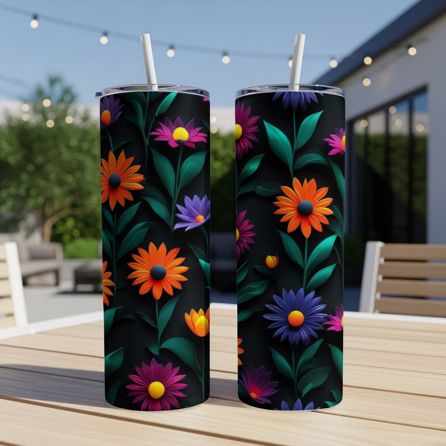 Two tumblers with a dark floral pattern featuring orange, purple, and pink flowers.