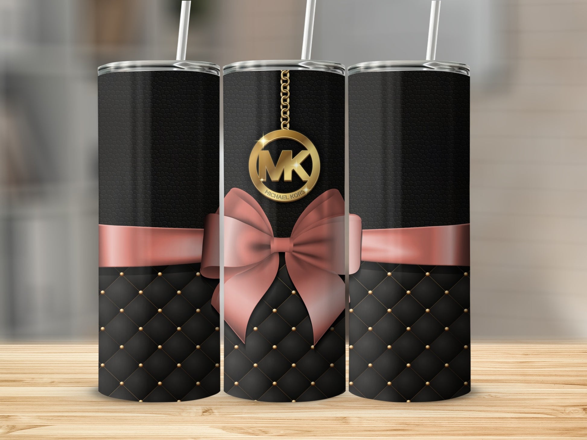 Elegant Black and Gold Michael Kors Tumbler Design