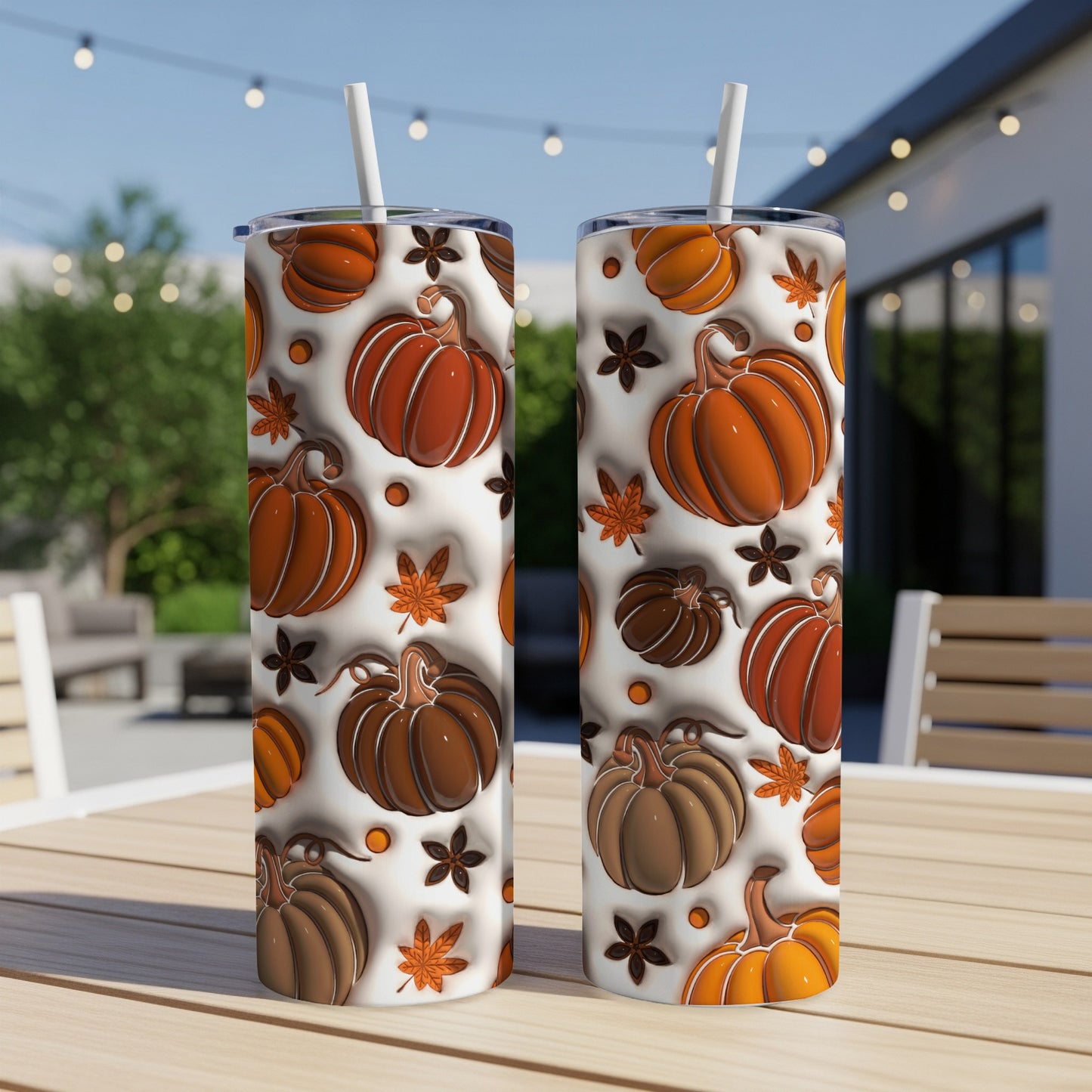 Two tumblers with fall pumpkin and leaf pattern.