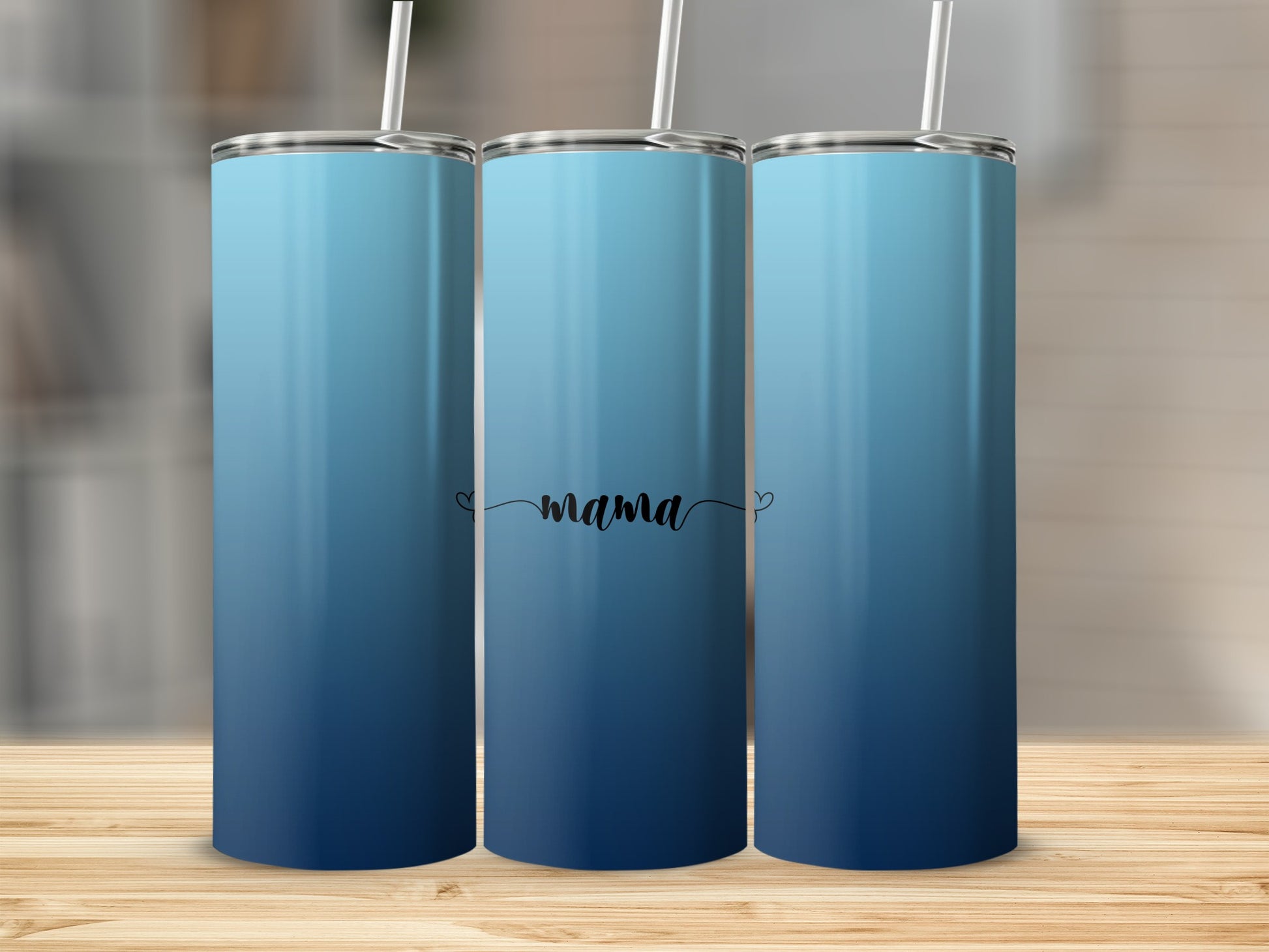 Three tumblers with a blue gradient and the word "mama" on the front tumbler.