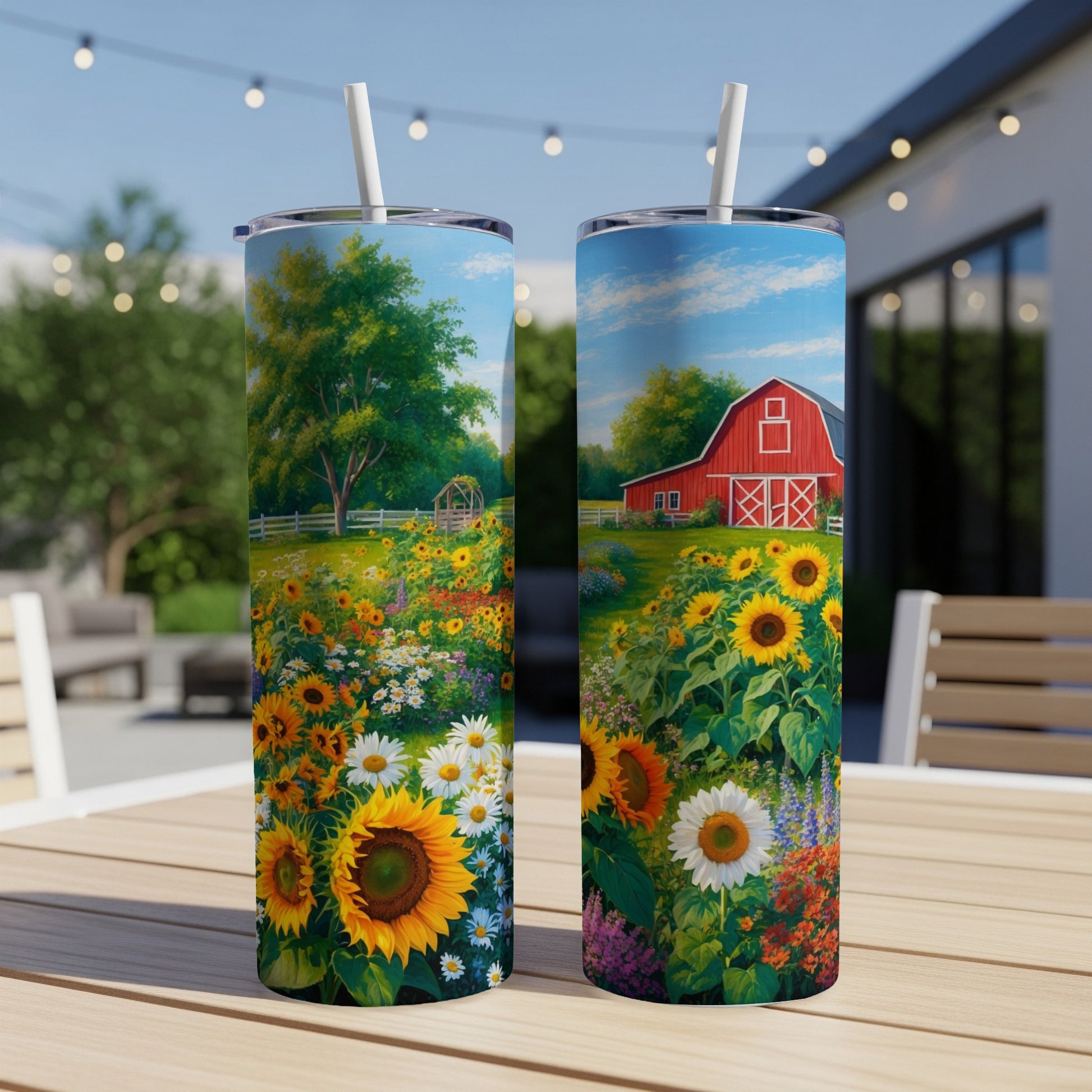 Two tumblers with a vibrant sunflower and red barn farm scene design.