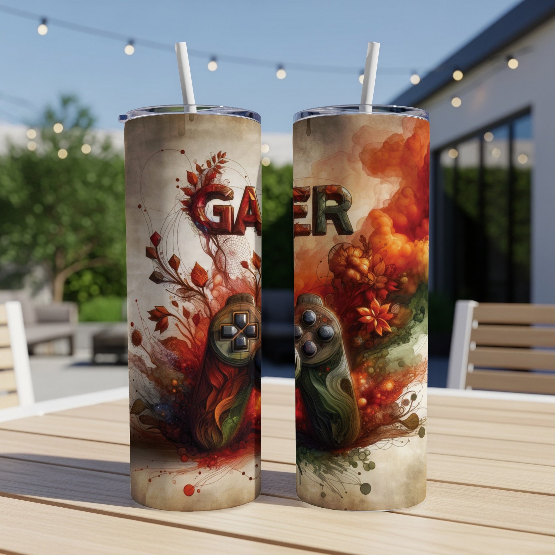 Two tumblers with gamer design and "GA MER" text on table.