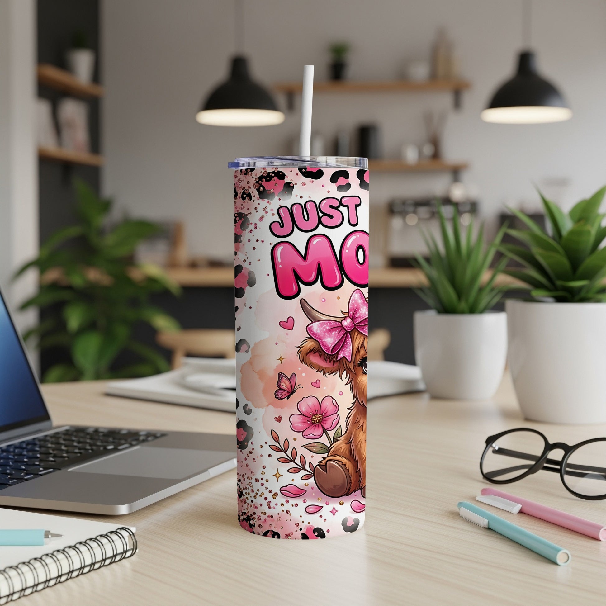 Pink tumbler with cow, bow, and text "Just Moo".