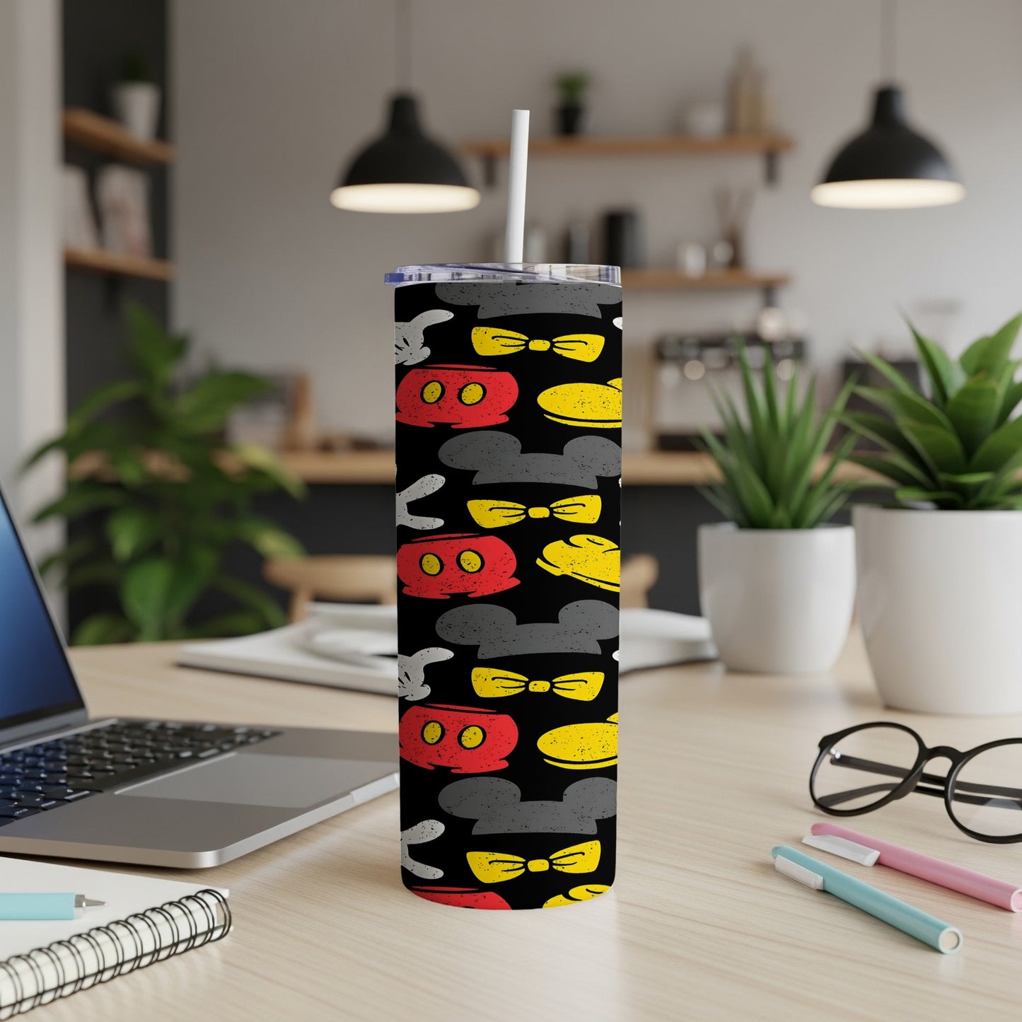 Mickey Mouse ears, bowties, and gloves pattern on a black tumbler.