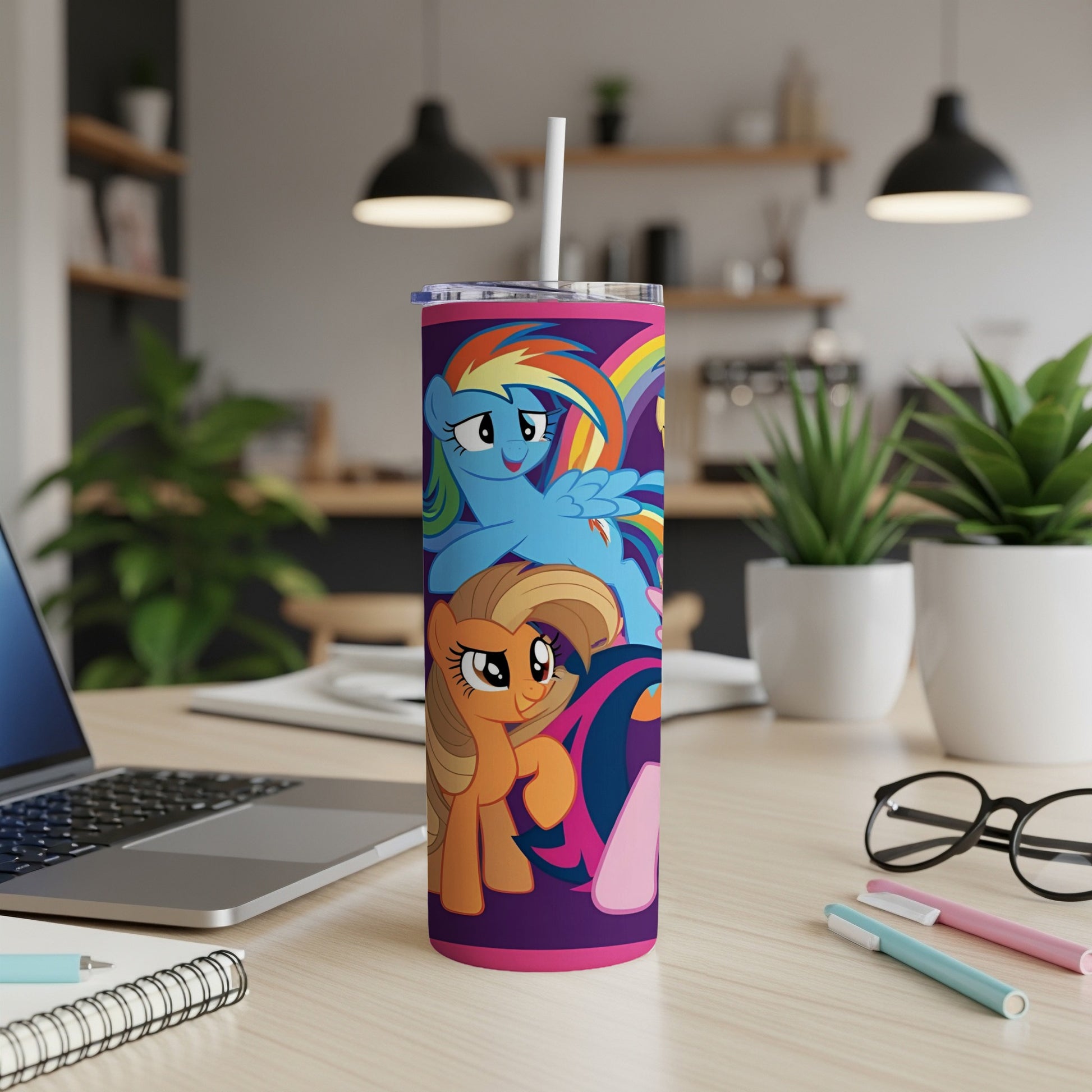 My Little Pony characters on a purple tumbler with a straw.