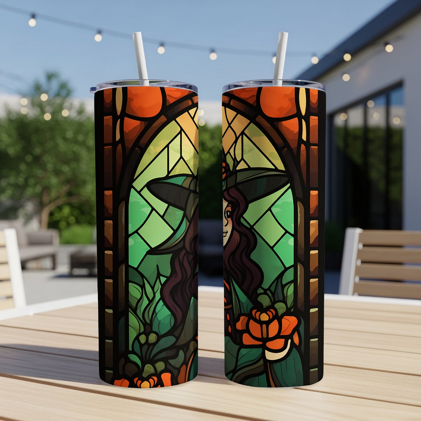 Two witch-themed tumblers with stained-glass design and floral accents.