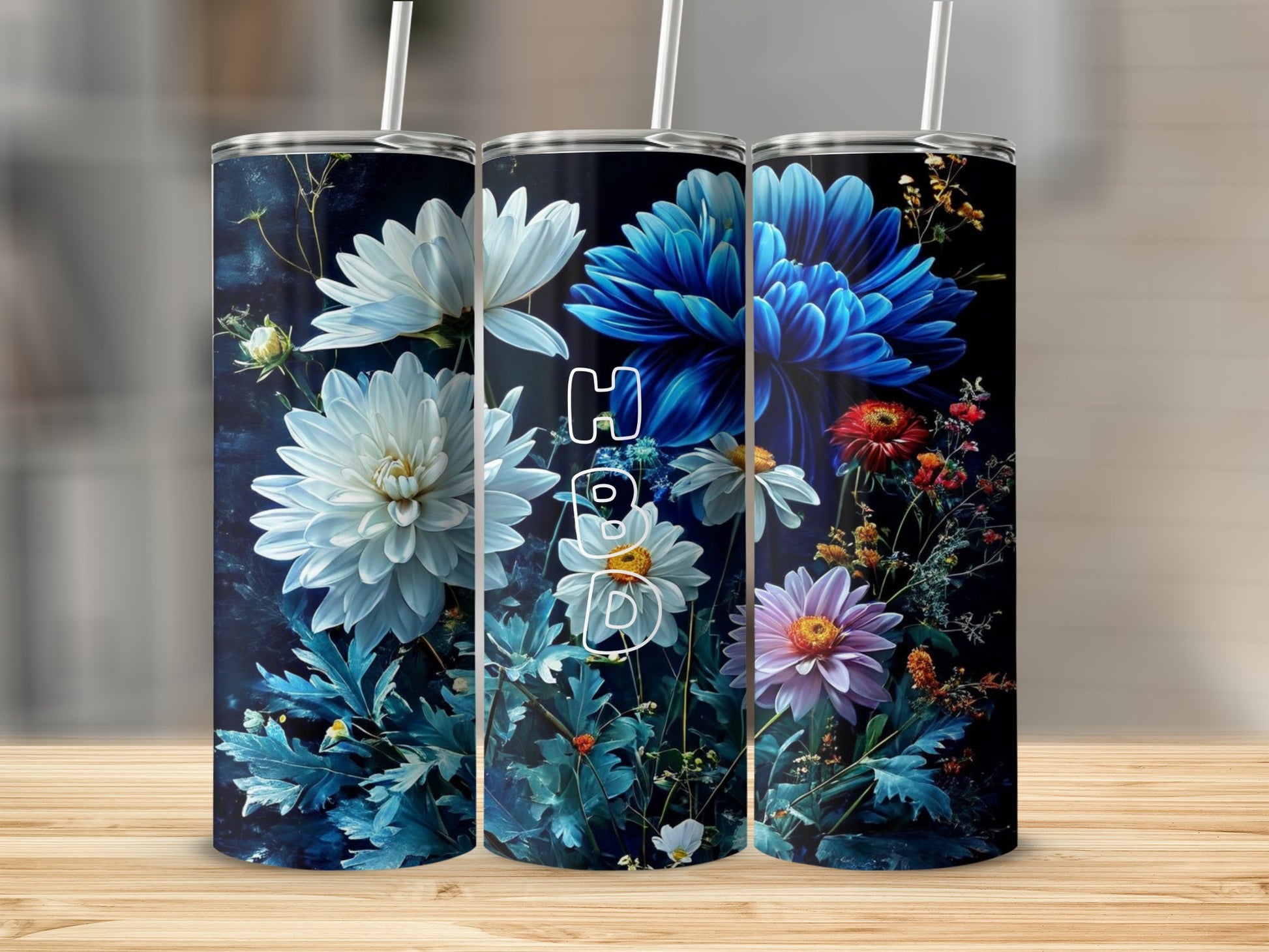 Tall tumblers with floral designs and the word "Hope" in script.