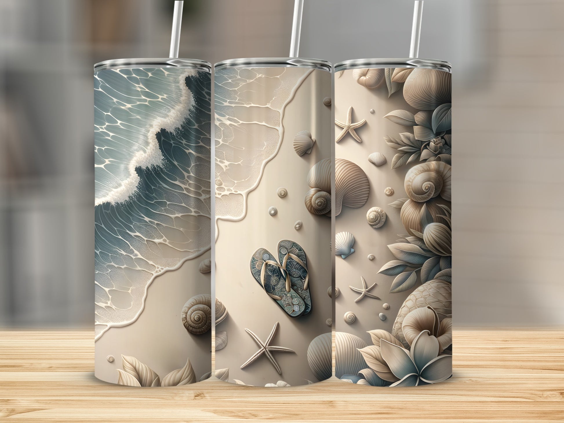 Three tumblers with beach-themed designs: waves, shells, and starfish.