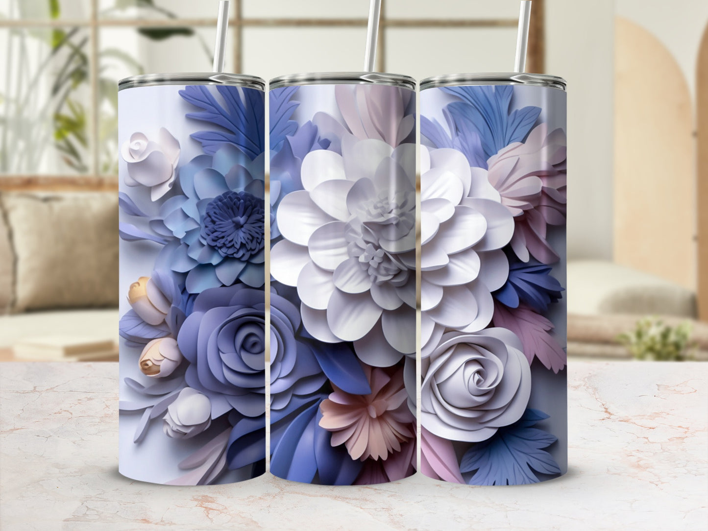 Three tumblers with detailed floral patterns in shades of purple and blue.