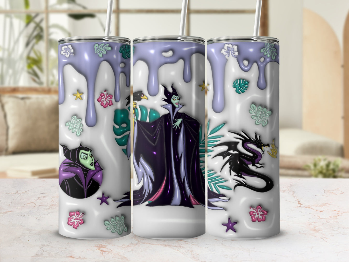 Maleficent and dragon design on three skinny tumblers with floral accents.