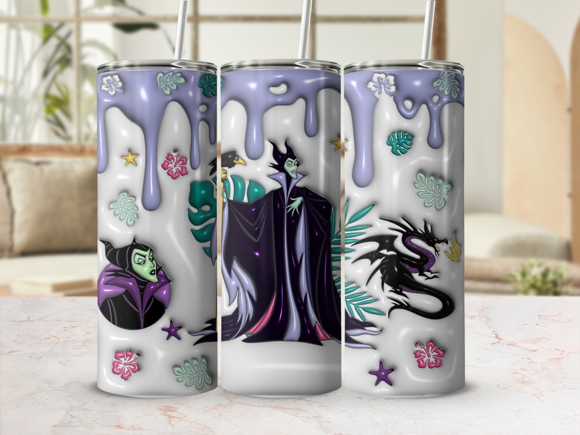 Maleficent and dragon design on three skinny tumblers with floral accents.