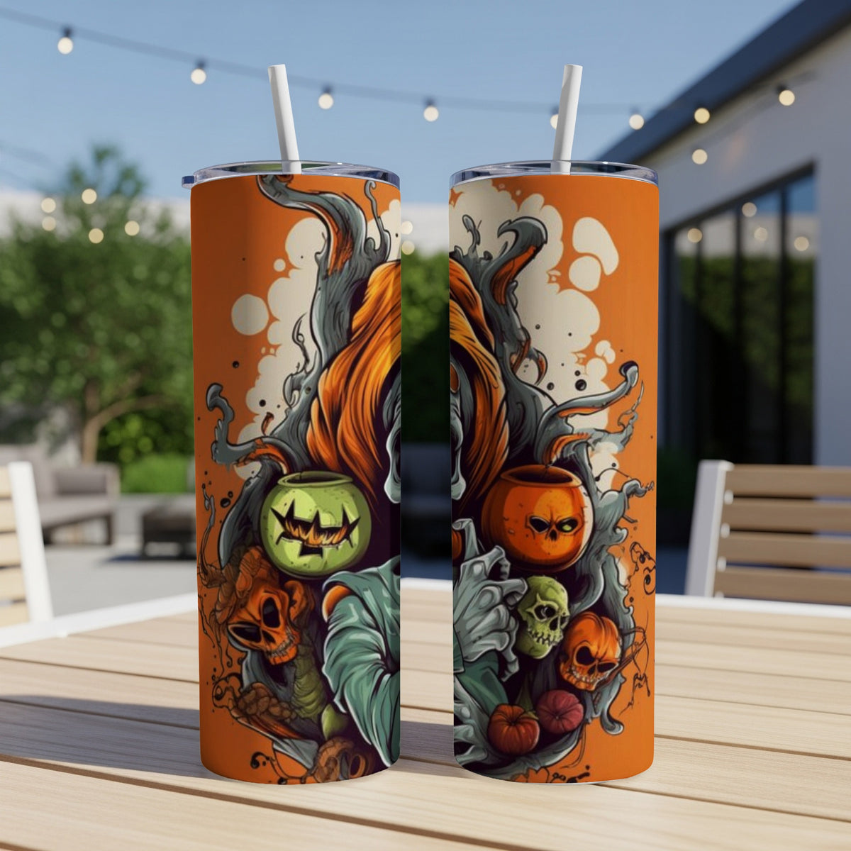 Two Halloween-themed tumblers with skulls, pumpkins, and spooky graphics.