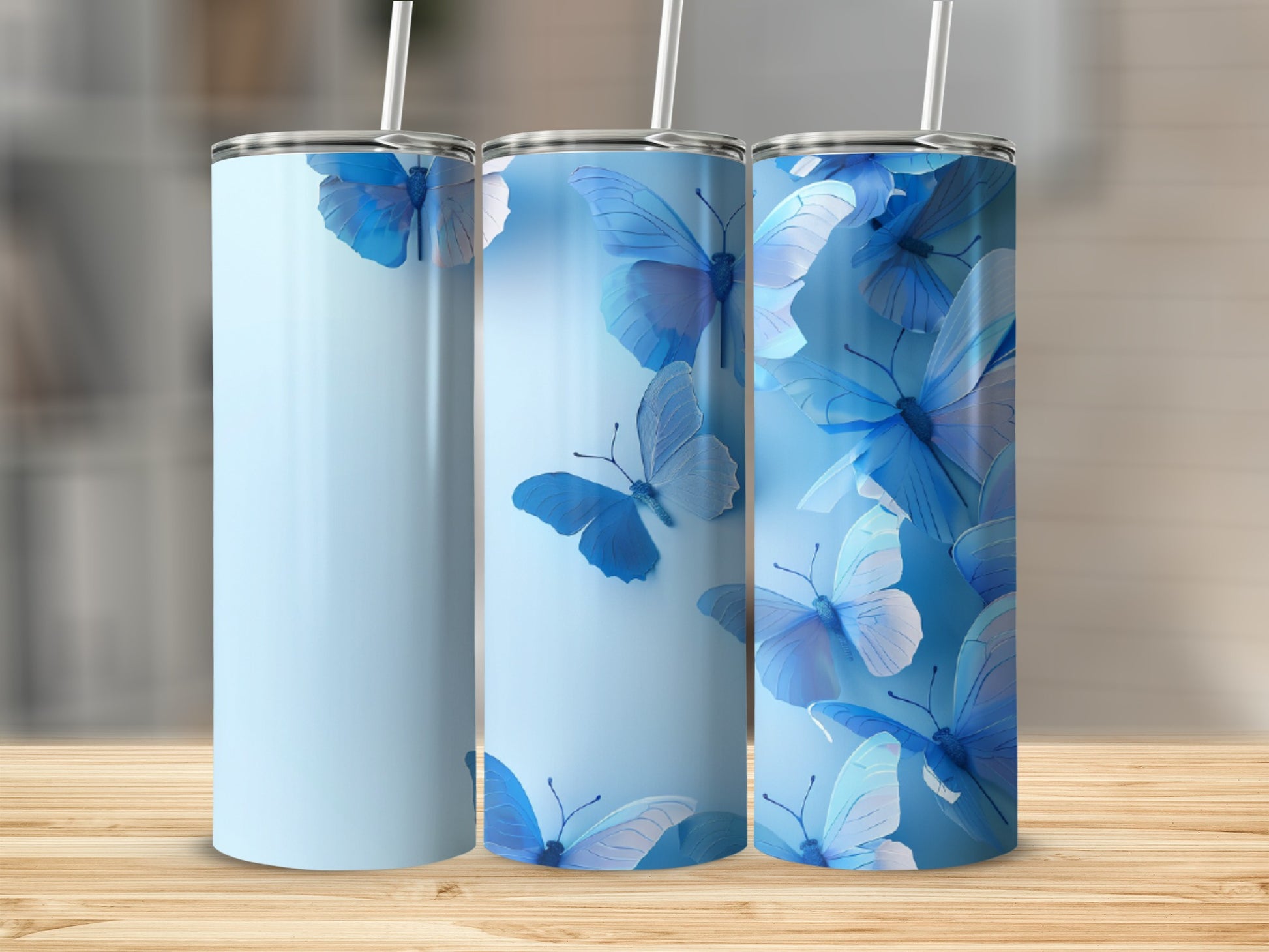 Light blue tumbler with blue butterflies, on a wooden surface.