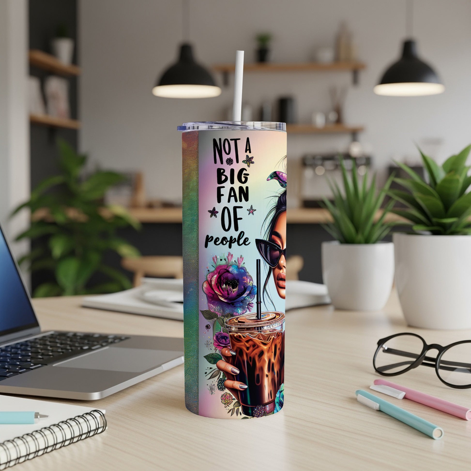 Tumbler with "Not a big fan of people" and coffee art.