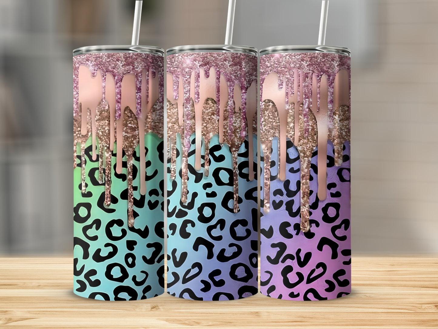 Three glitter drip tumblers with leopard print designs in green, pink, and purple.