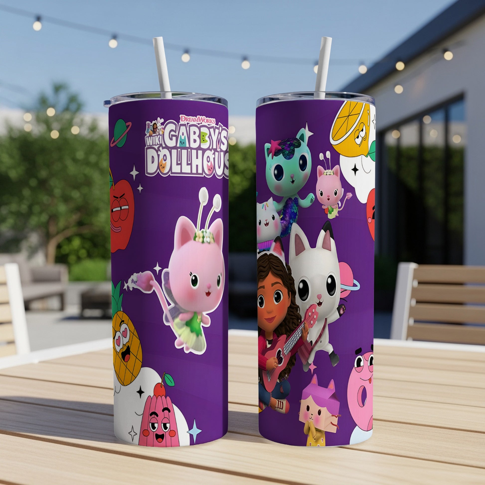 Gabby's Dollhouse characters on a purple tumbler with straw.