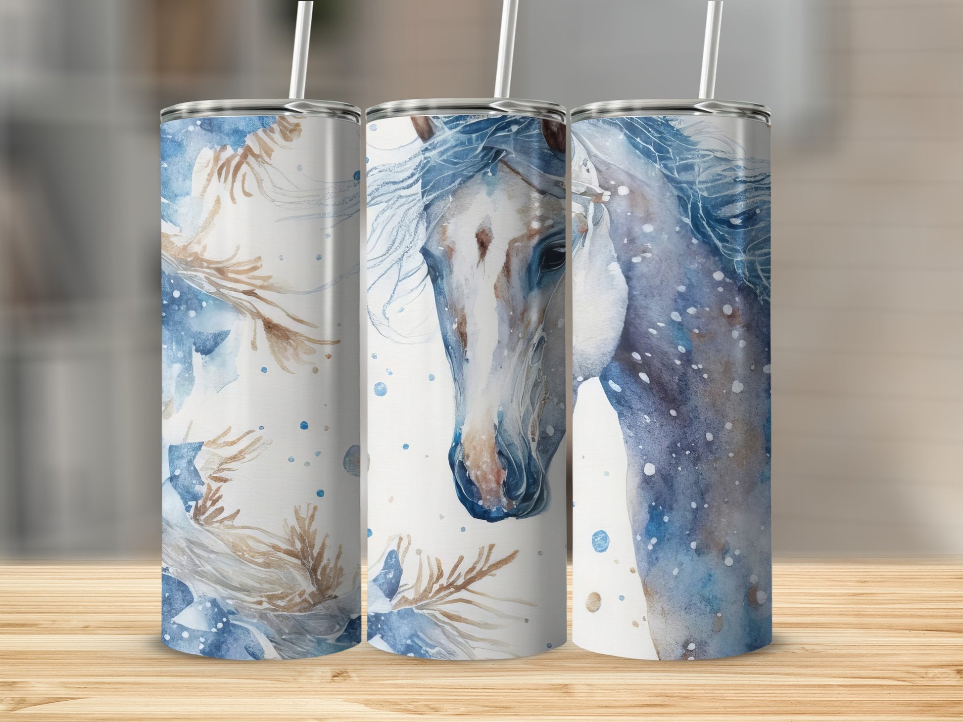 Watercolor horse design on three skinny tumblers with straws.