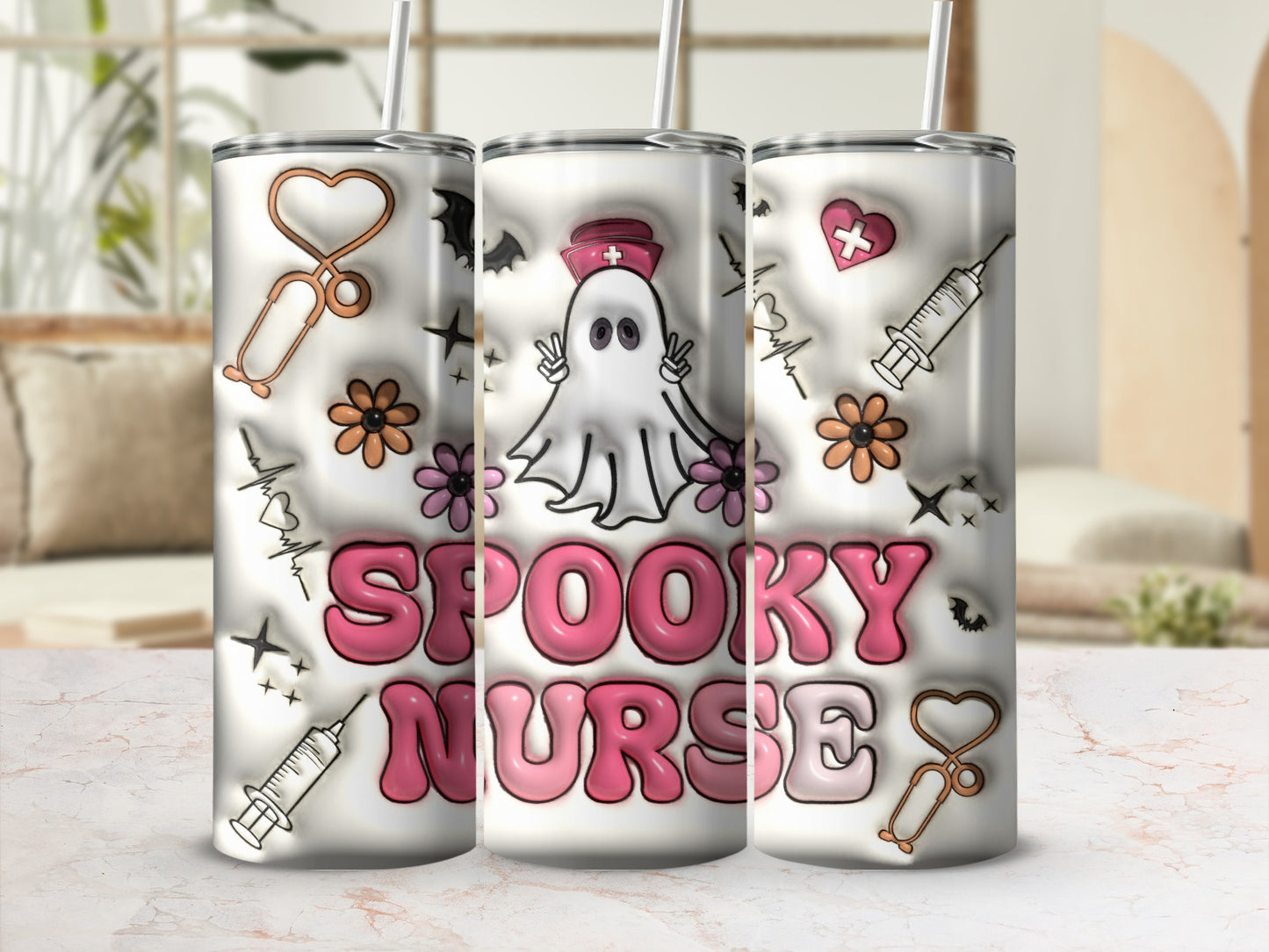 Pink and white Halloween nurse tumbler with "Spooky Nurse" text and medical icons.