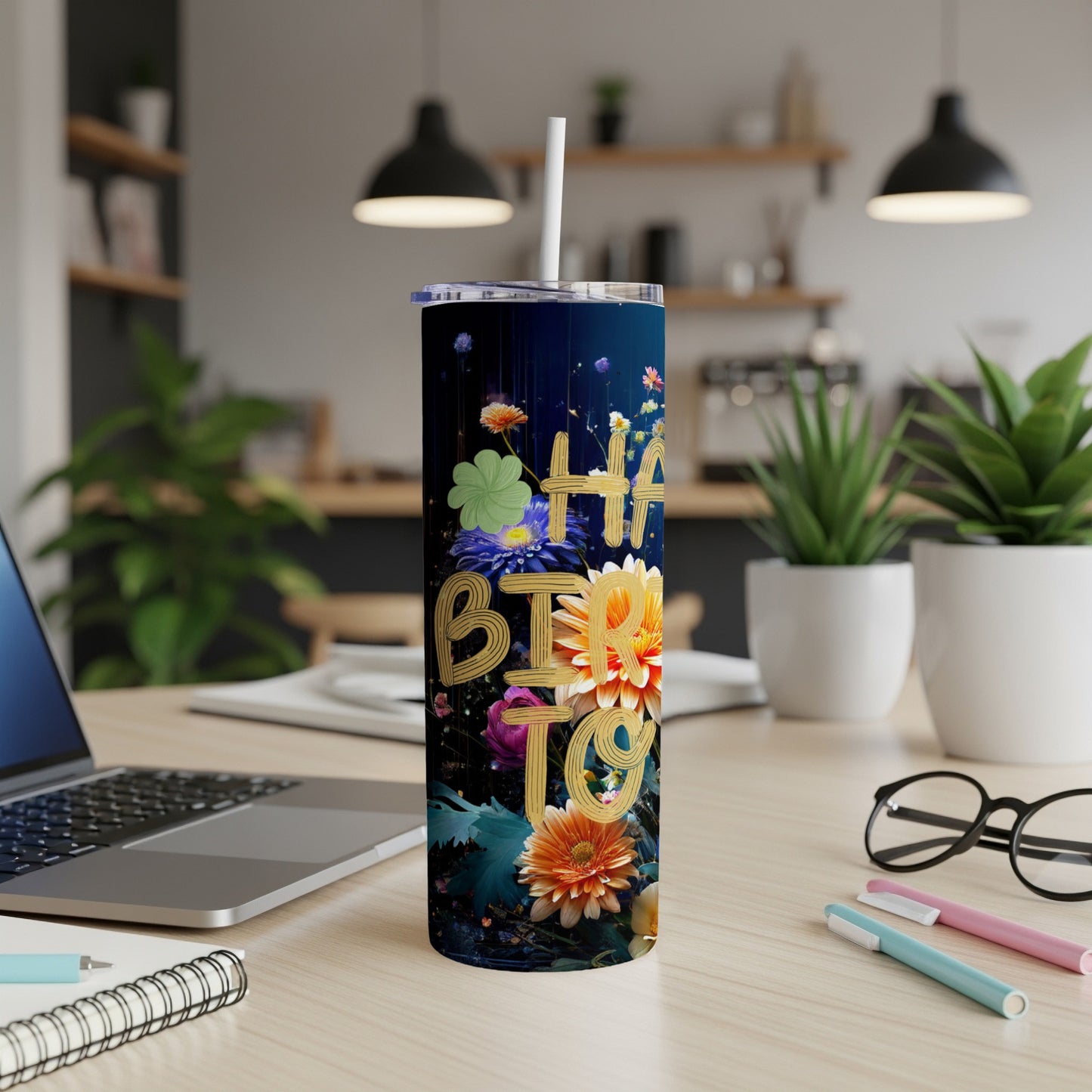 Dark tumbler with "Happy Birthday" in floral lettering and straw.