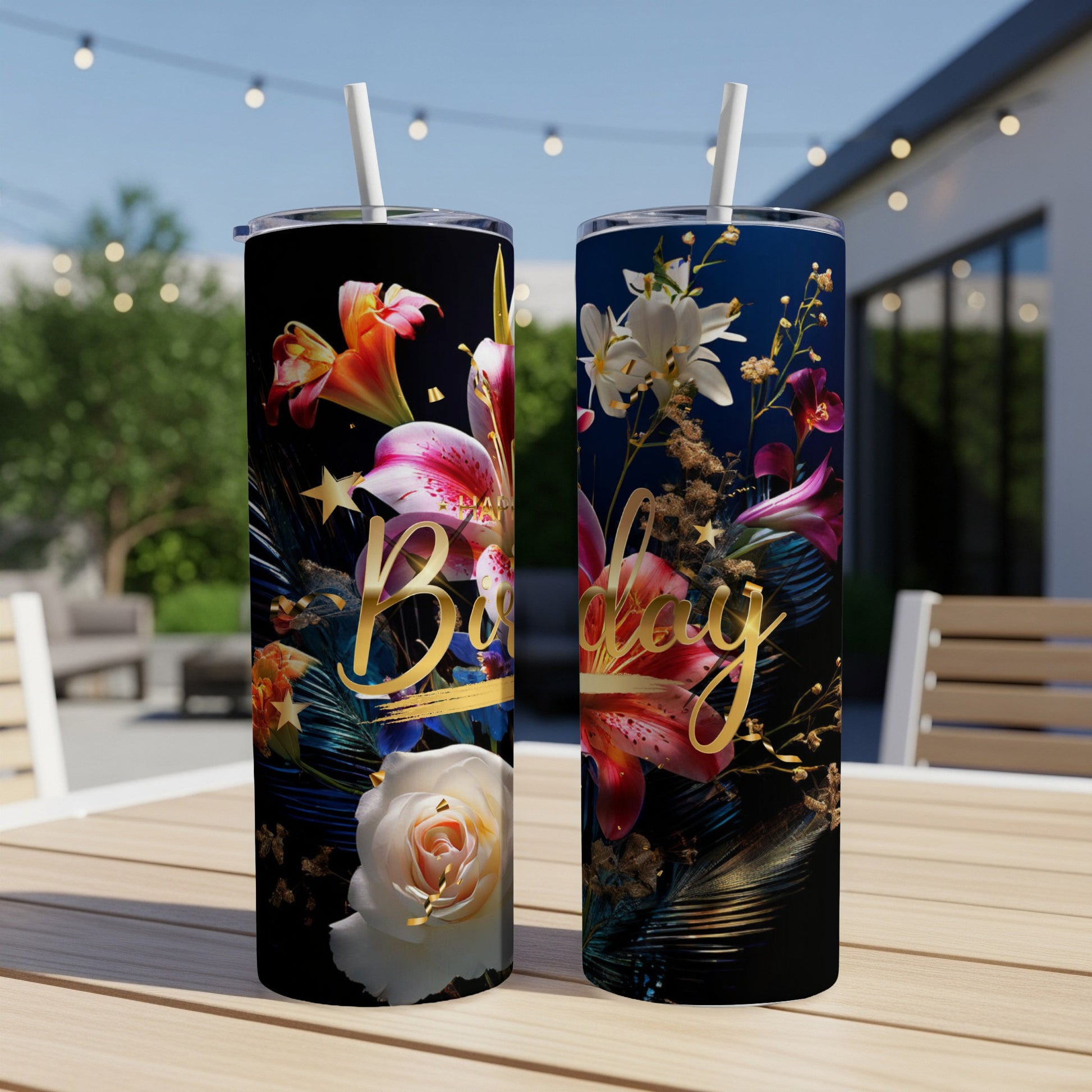 Two tumblers with floral designs and "Birthday" text on a wooden table.