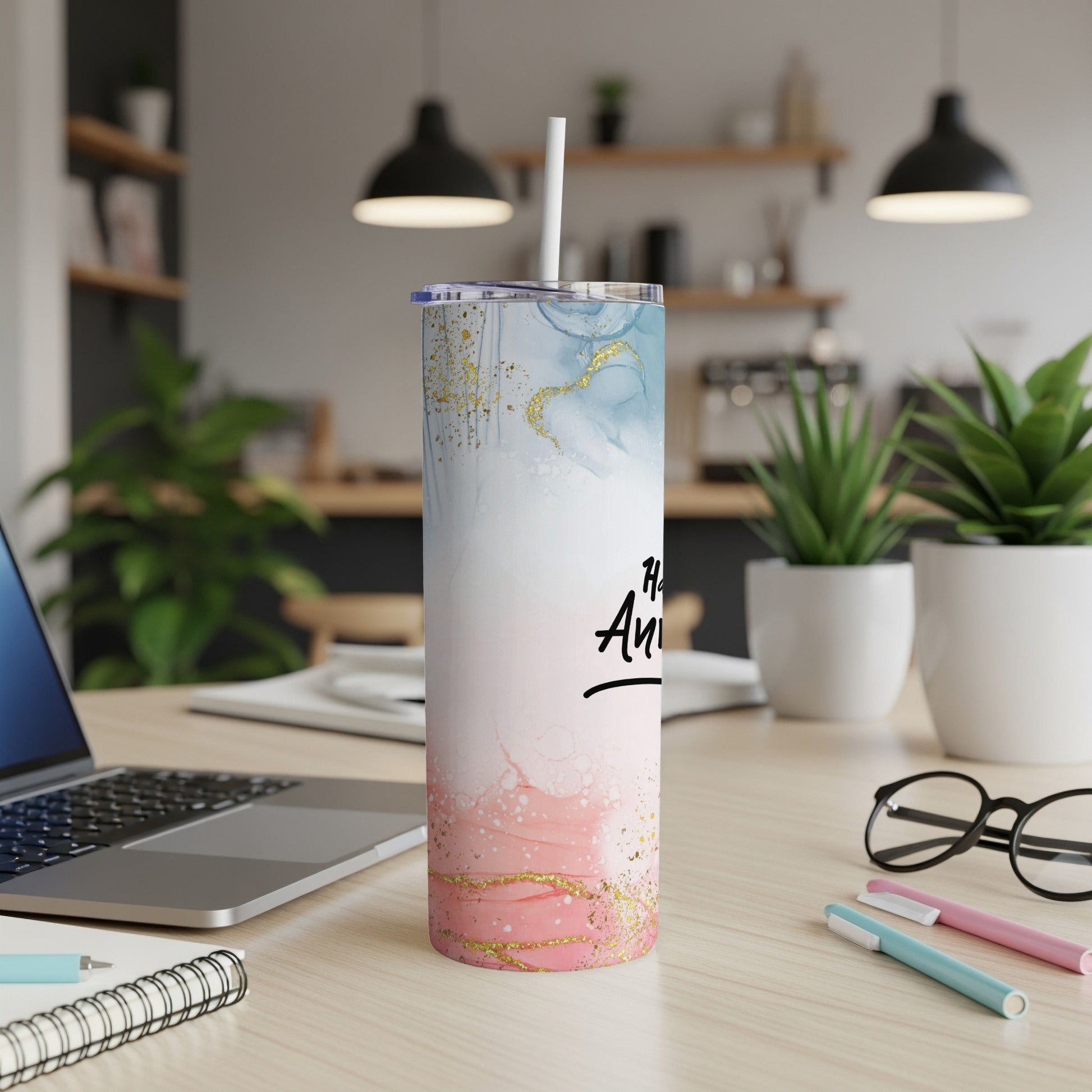 Tall pink and blue marbled tumbler with gold glitter and "Happy Anniversary" text.