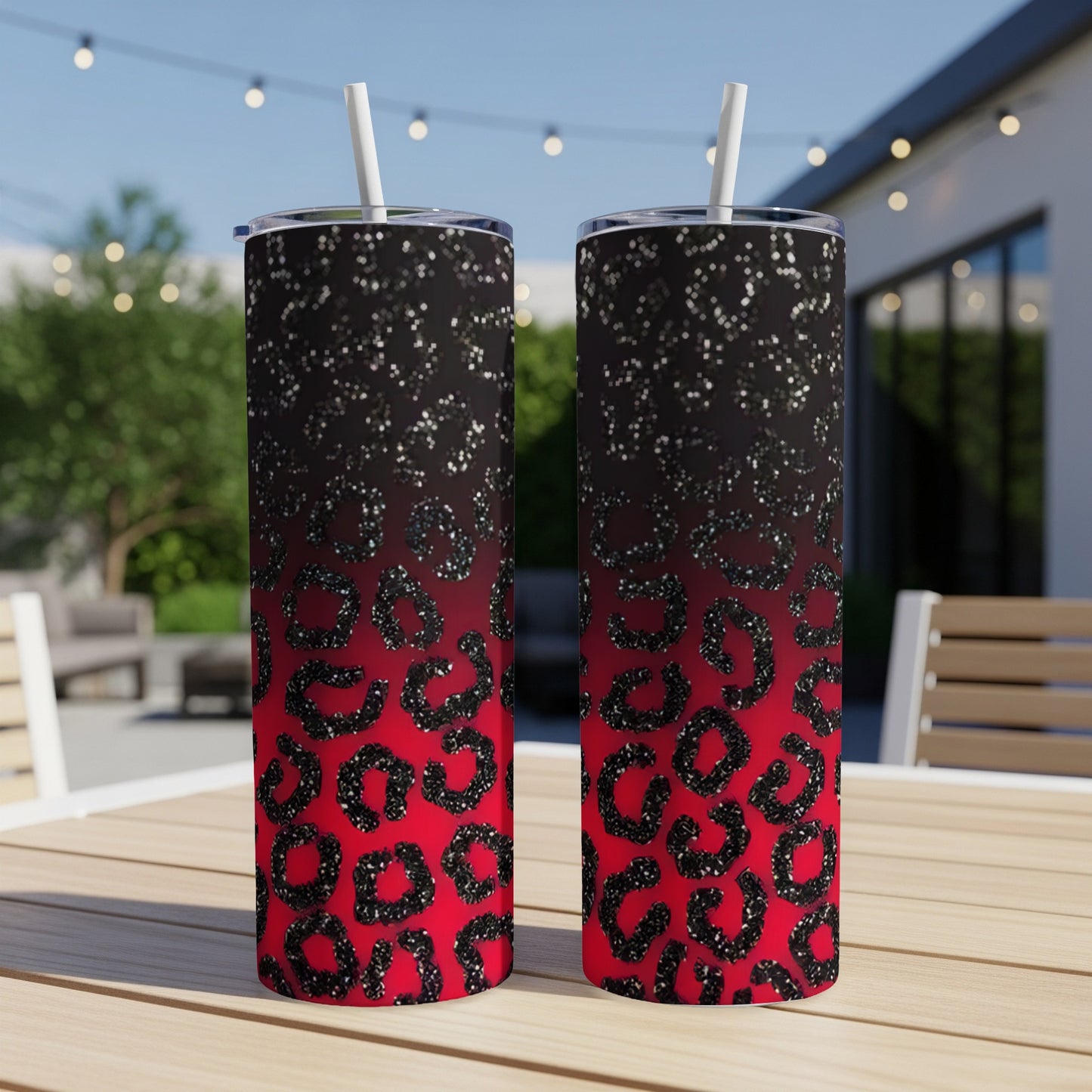 Two tall tumblers with red to black leopard print glitter ombre design.
