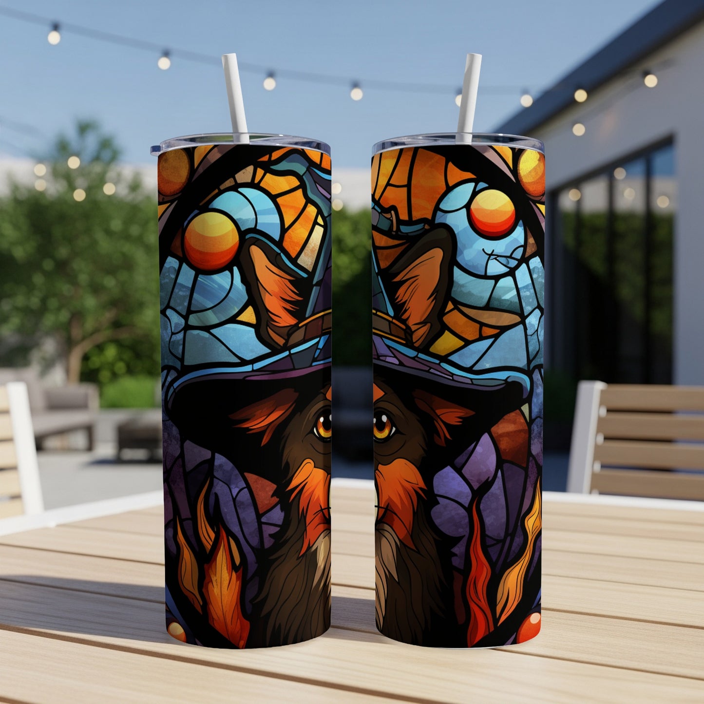 Two tumblers with a stained-glass style dog in a witch hat design.