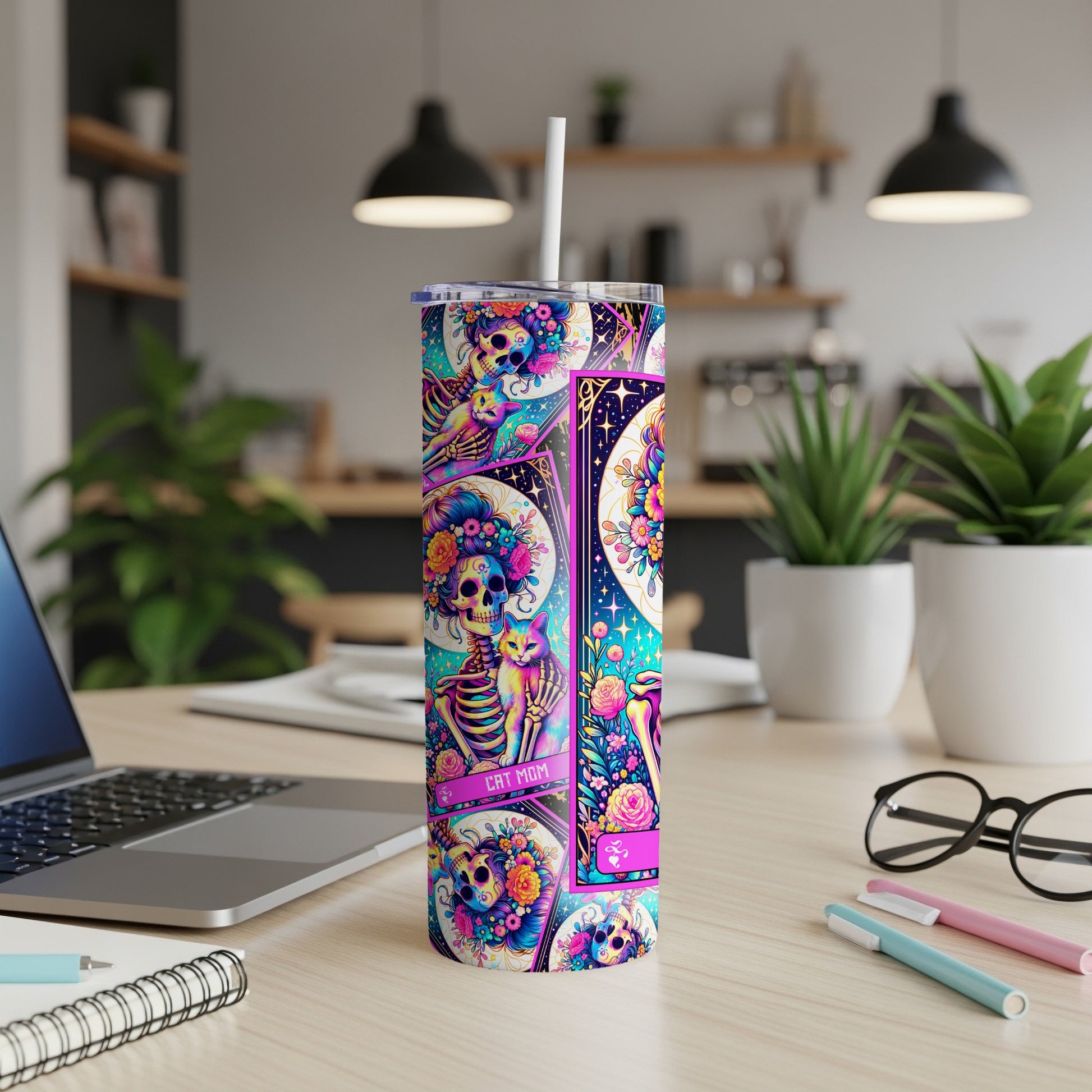 Cat Mom tumbler with colorful cat and floral skull design.