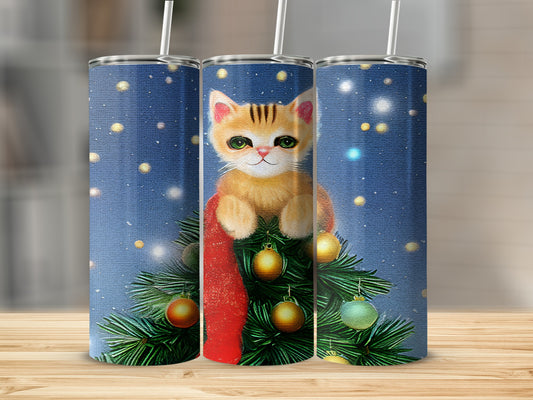 Christmas tree with a kitten, ornaments, and red ribbon.