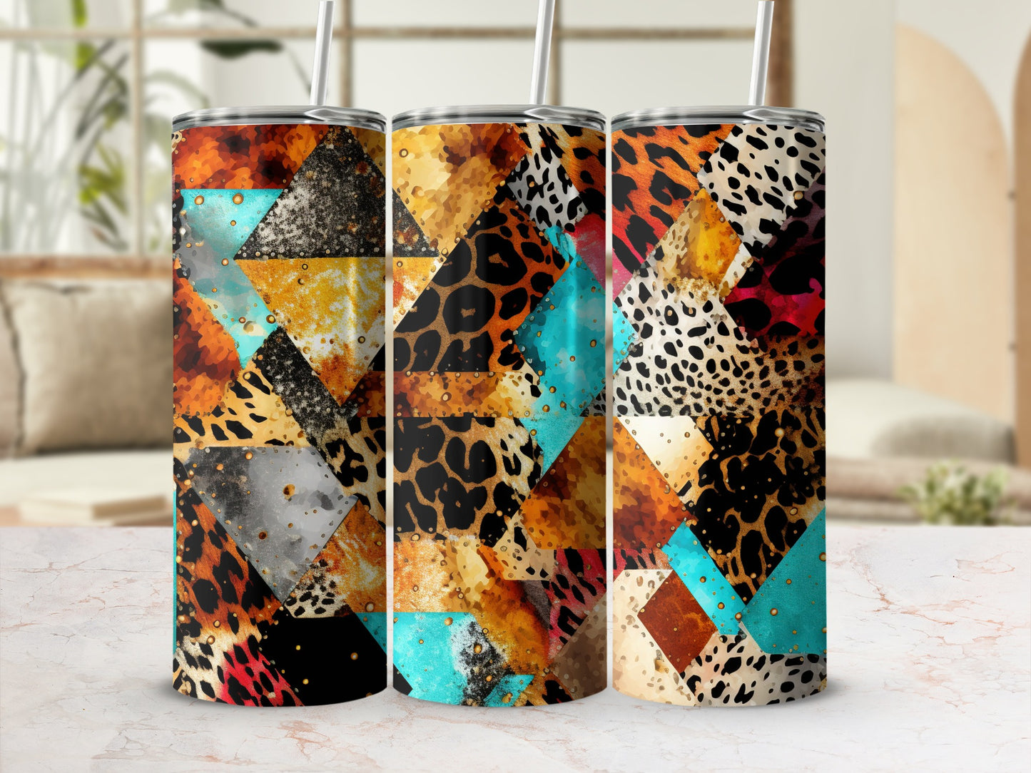Three tumblers with abstract animal print and geometric patterns.