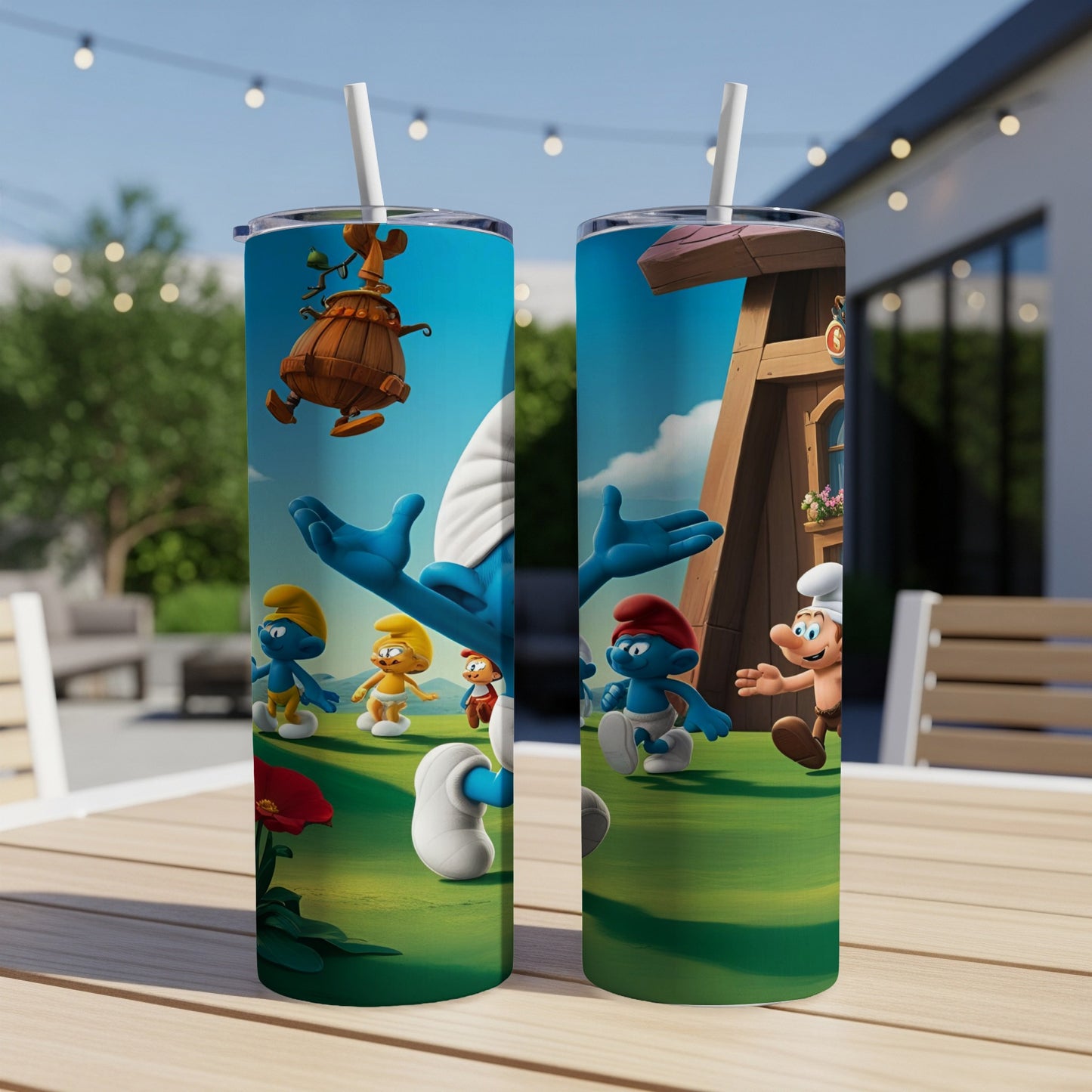 Smurfs illustration on a pair of white tumblers with straws.