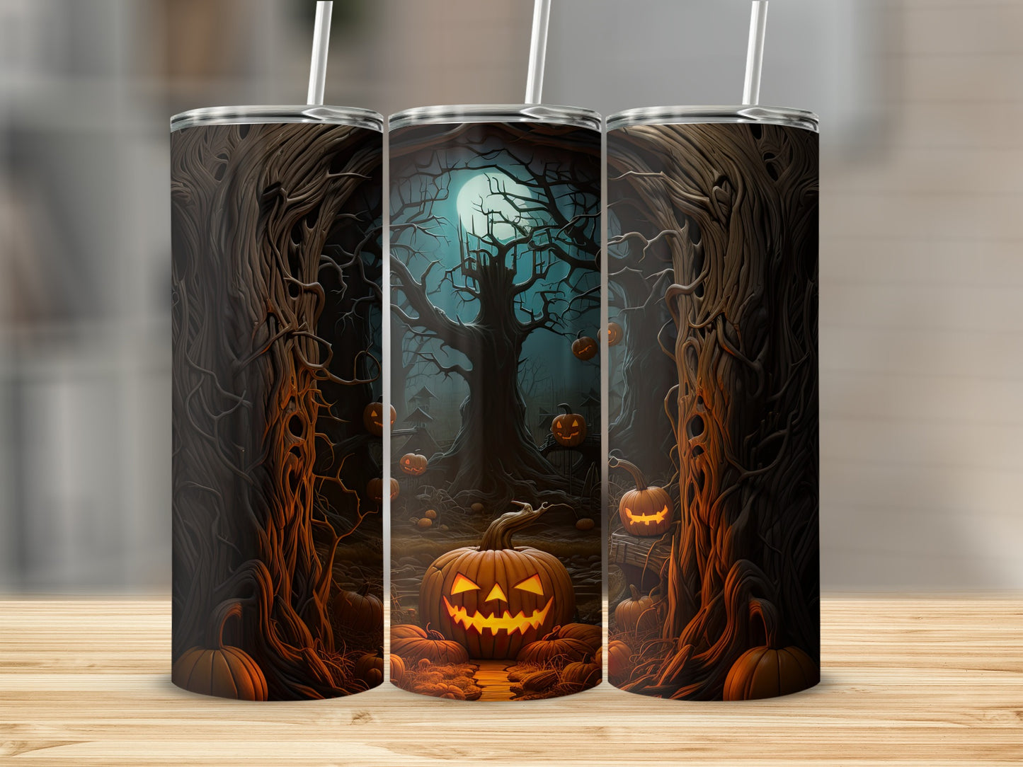 Three tumblers with a spooky Halloween forest scene featuring pumpkins and a full moon.