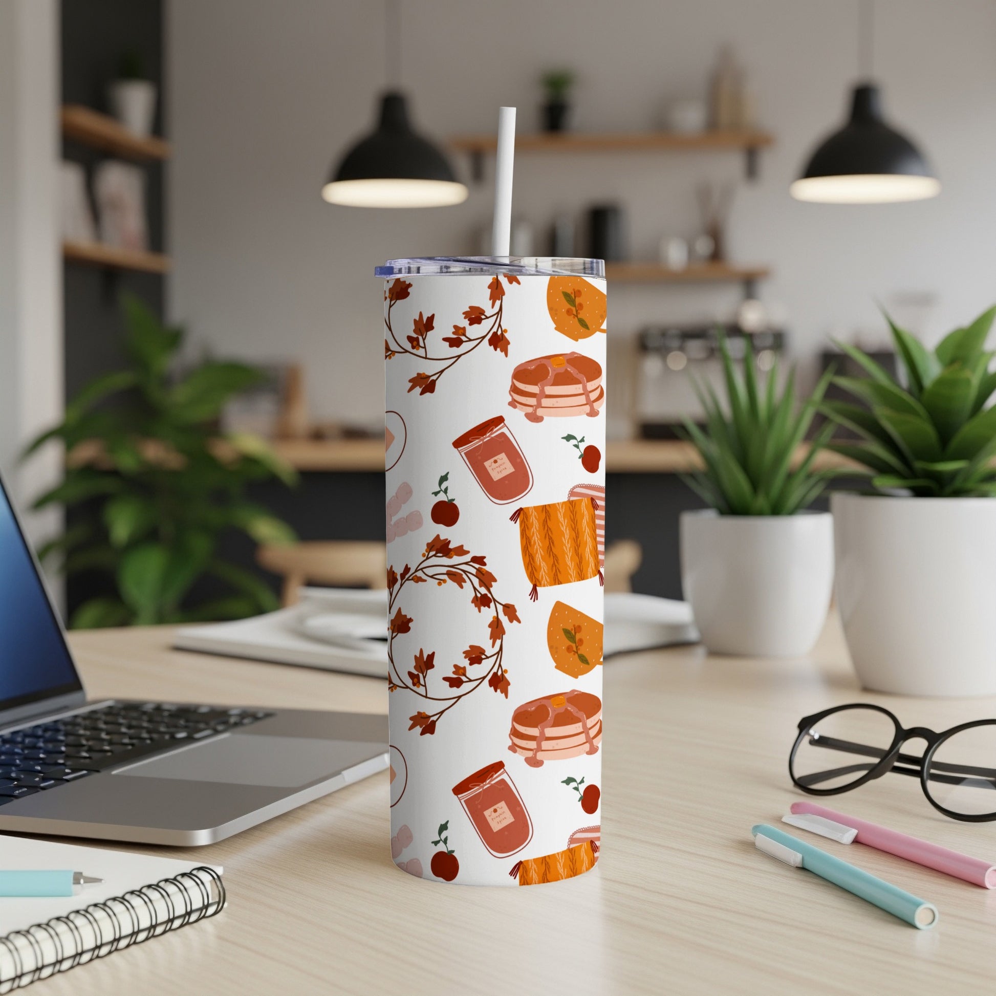 Fall-themed tumbler with pancakes, jam jars, and leaves pattern.