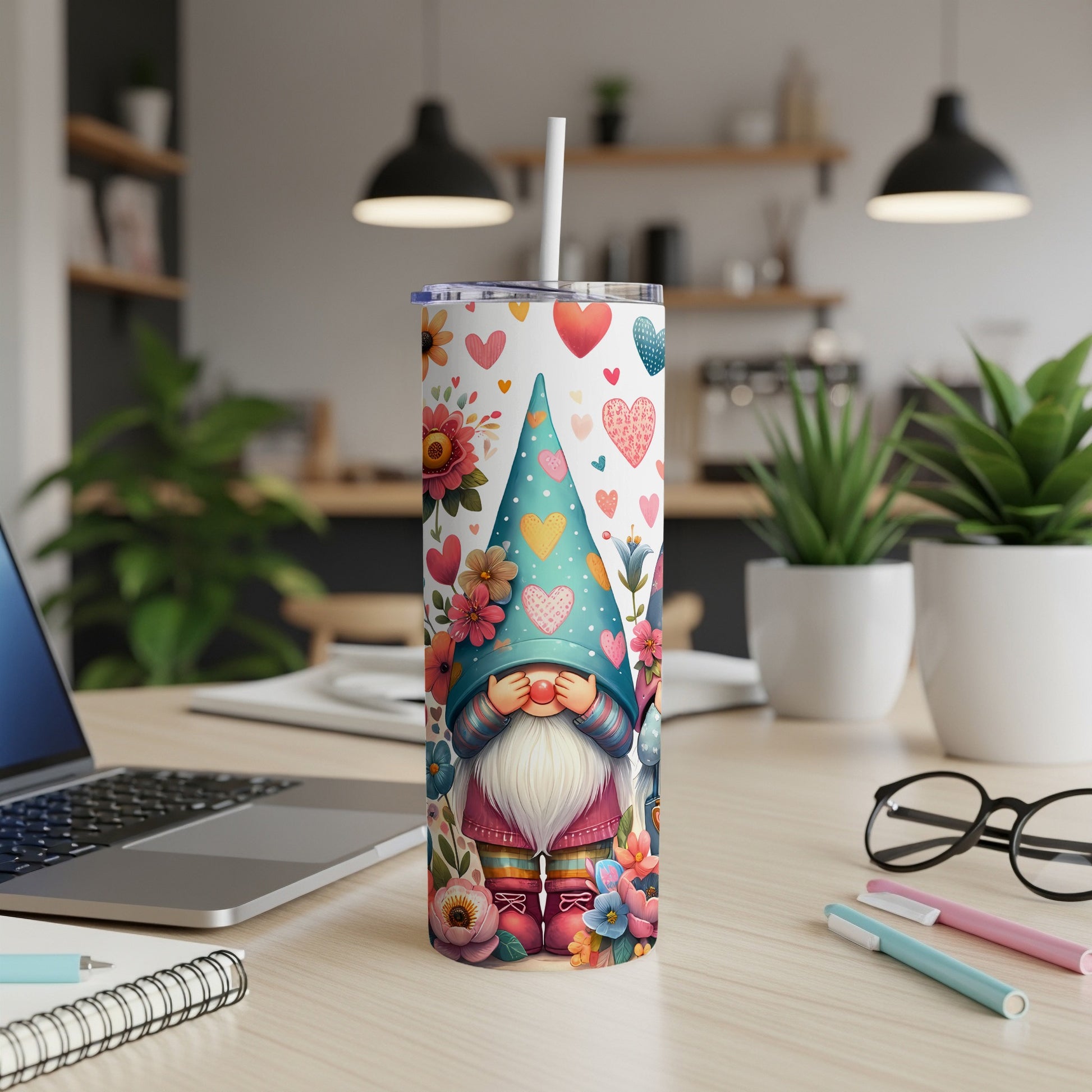 Gnome with flowers and hearts on a white tumbler with a straw.
