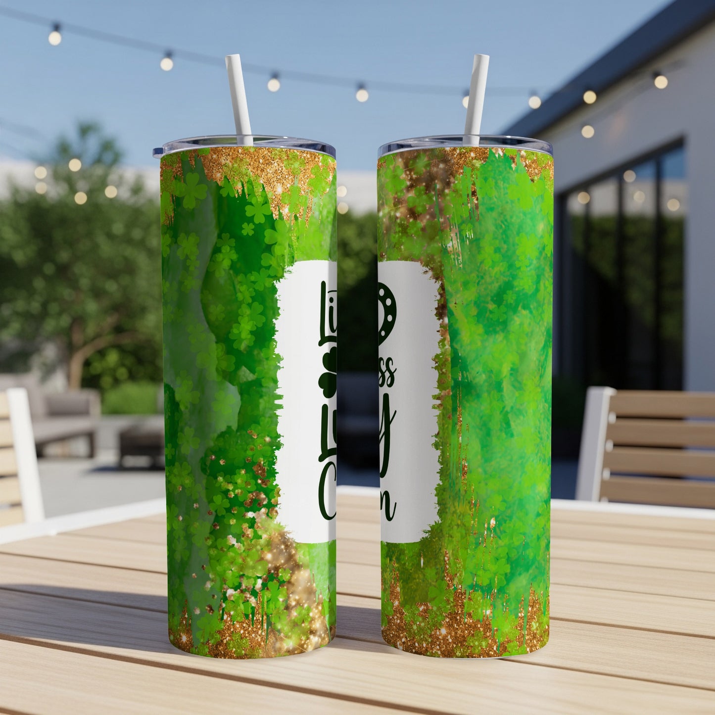Green St. Patrick's Day tumbler with glitter and shamrock pattern.