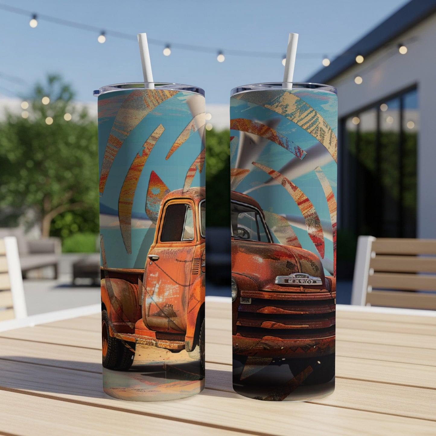 Two tumblers with a rusty vintage truck and abstract sunburst design.