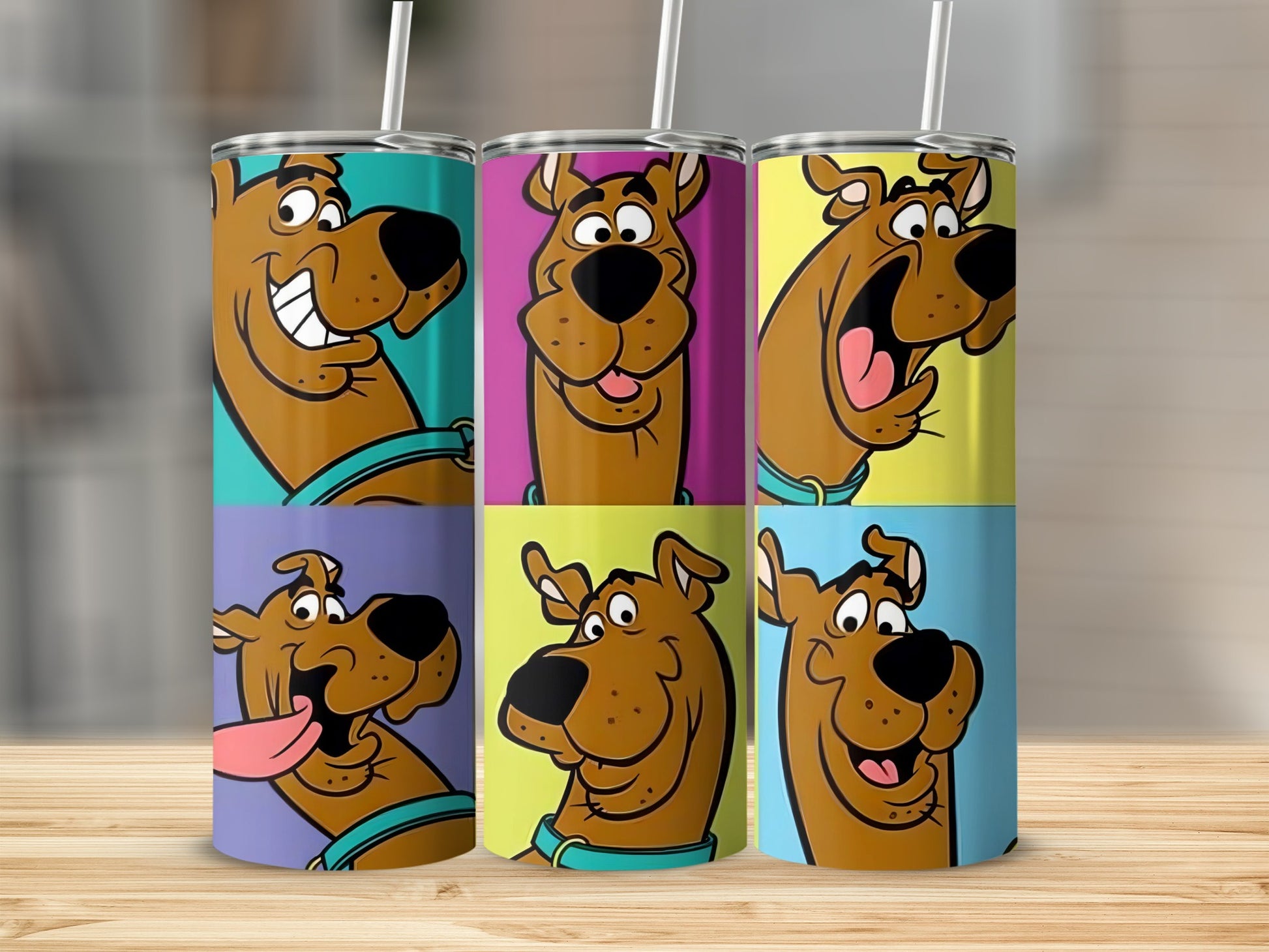 Scooby-Doo's face in six colorful panels on a tumbler.