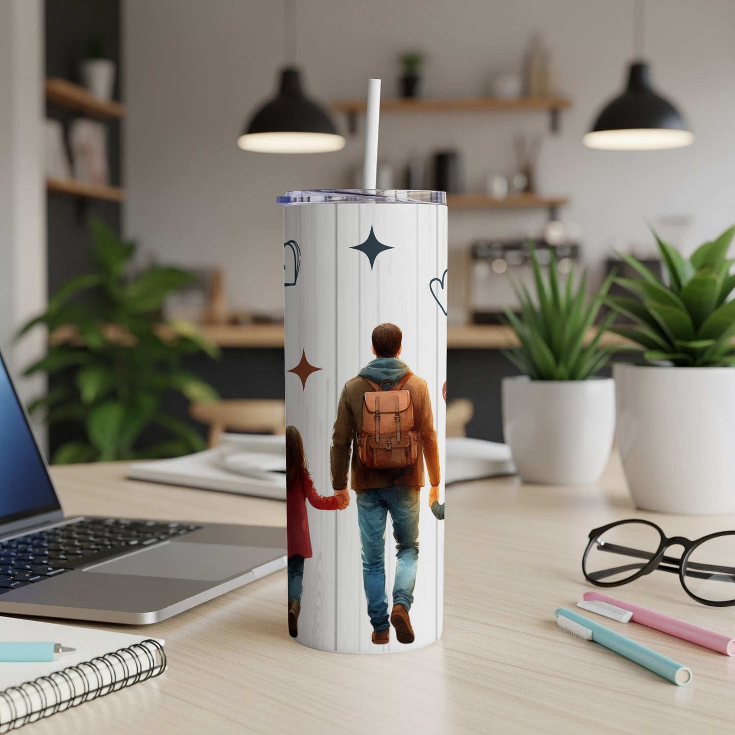 Tumbler shows father and child holding hands with stars and hearts designs.