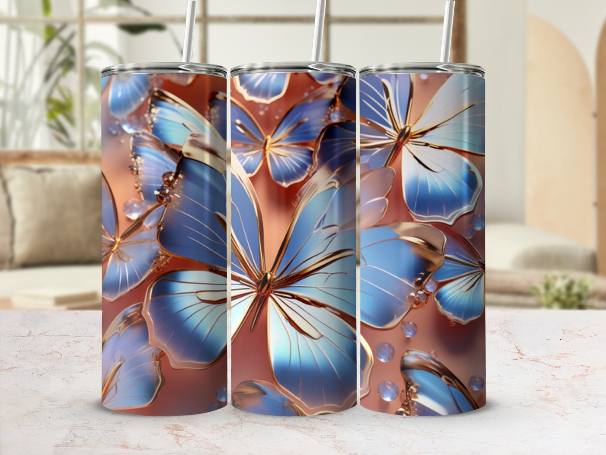 Three tumblers with iridescent blue butterfly and bubble design.