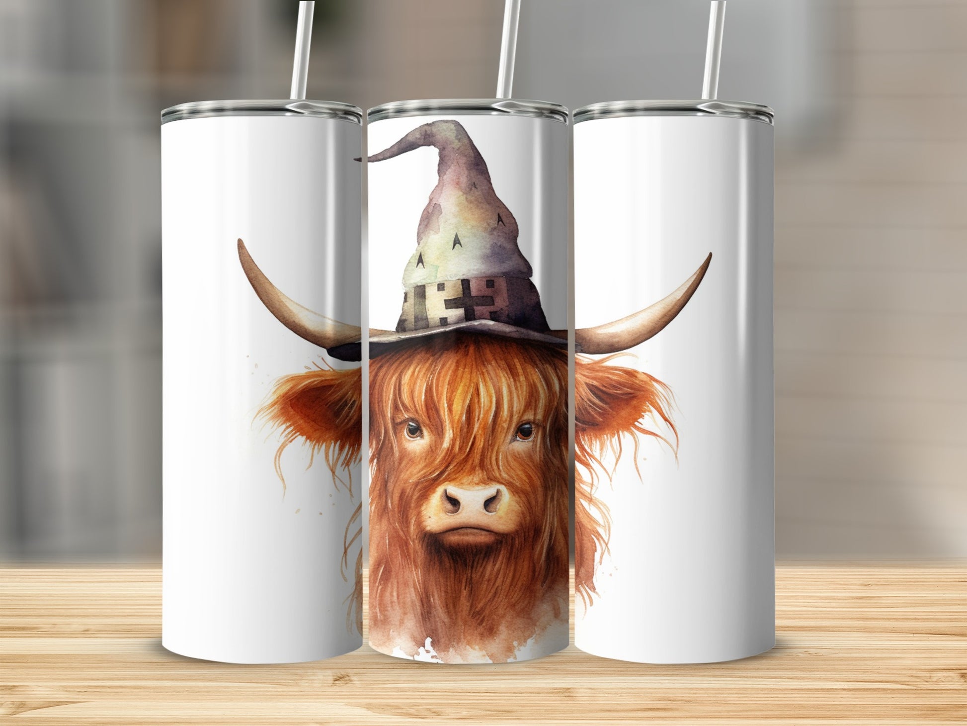 Highland cow wearing a witch hat and Halloween decorations.