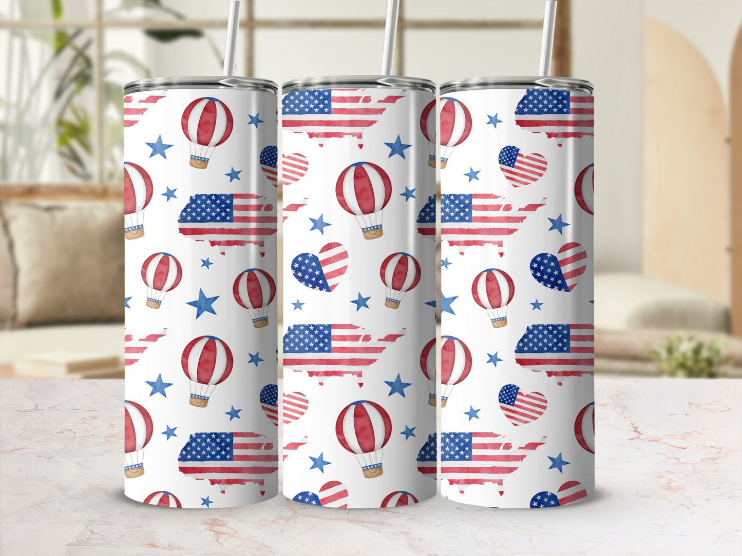 Tumbler with US flag map, hearts, stars, and hot air balloons.