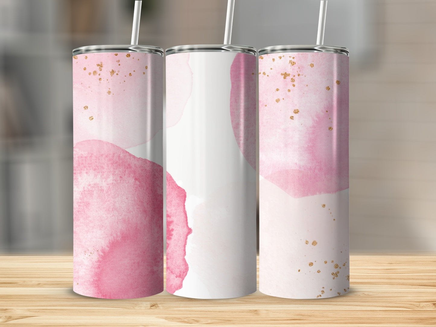 Three tall tumblers with pink watercolor and gold glitter design.