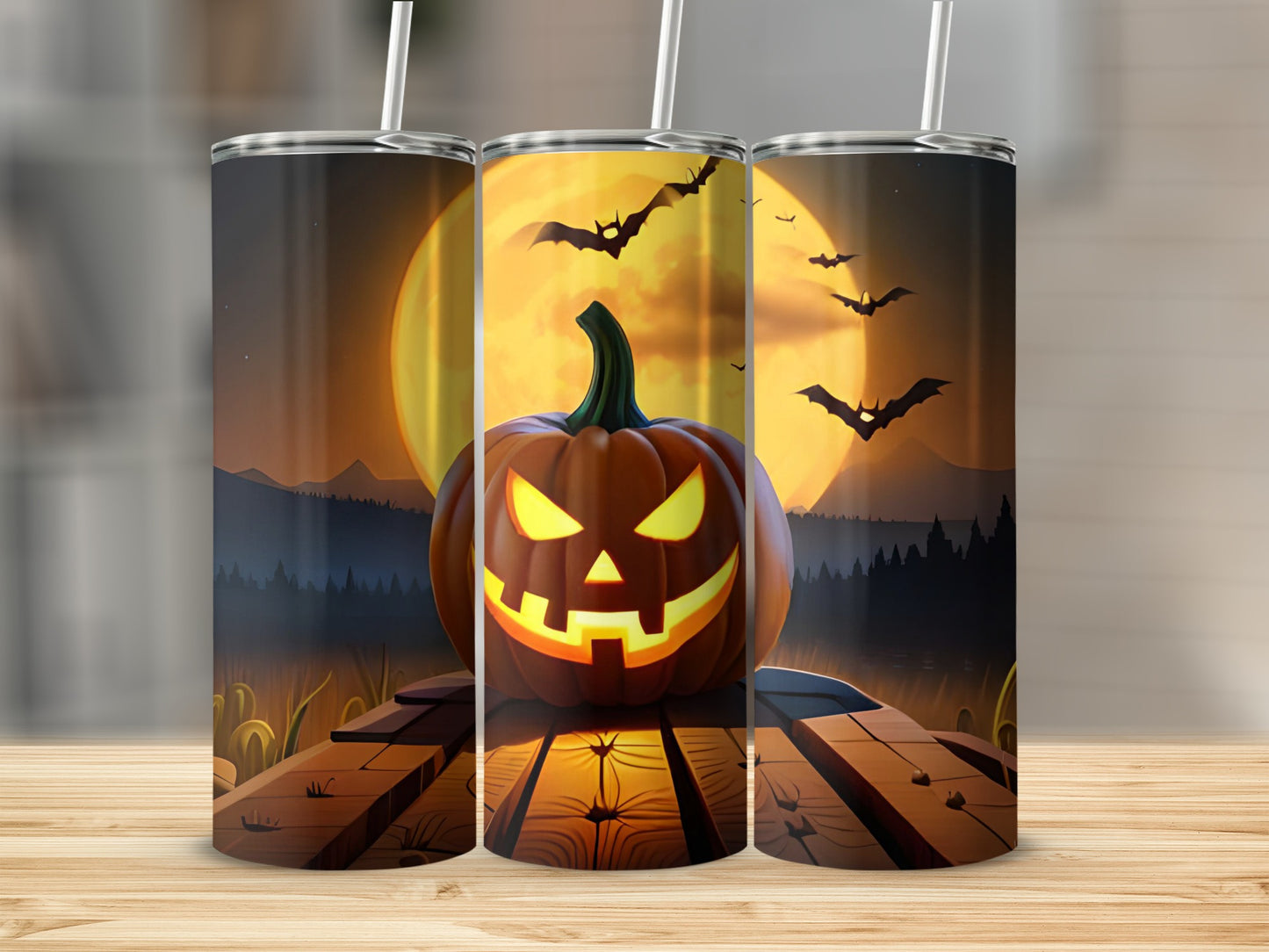 Three tumblers with a Halloween scene featuring a jack-o'-lantern and bats.