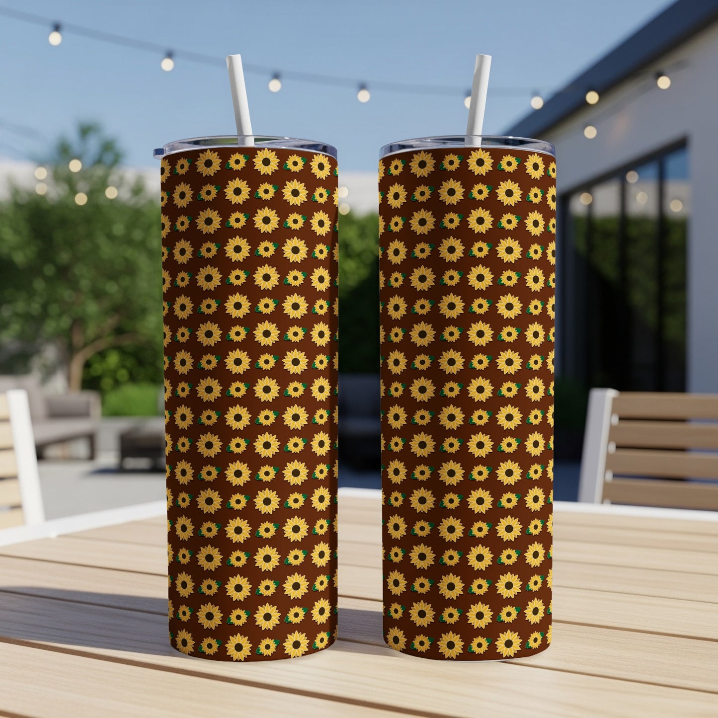 Two tall tumblers with a brown background and yellow sunflower pattern.