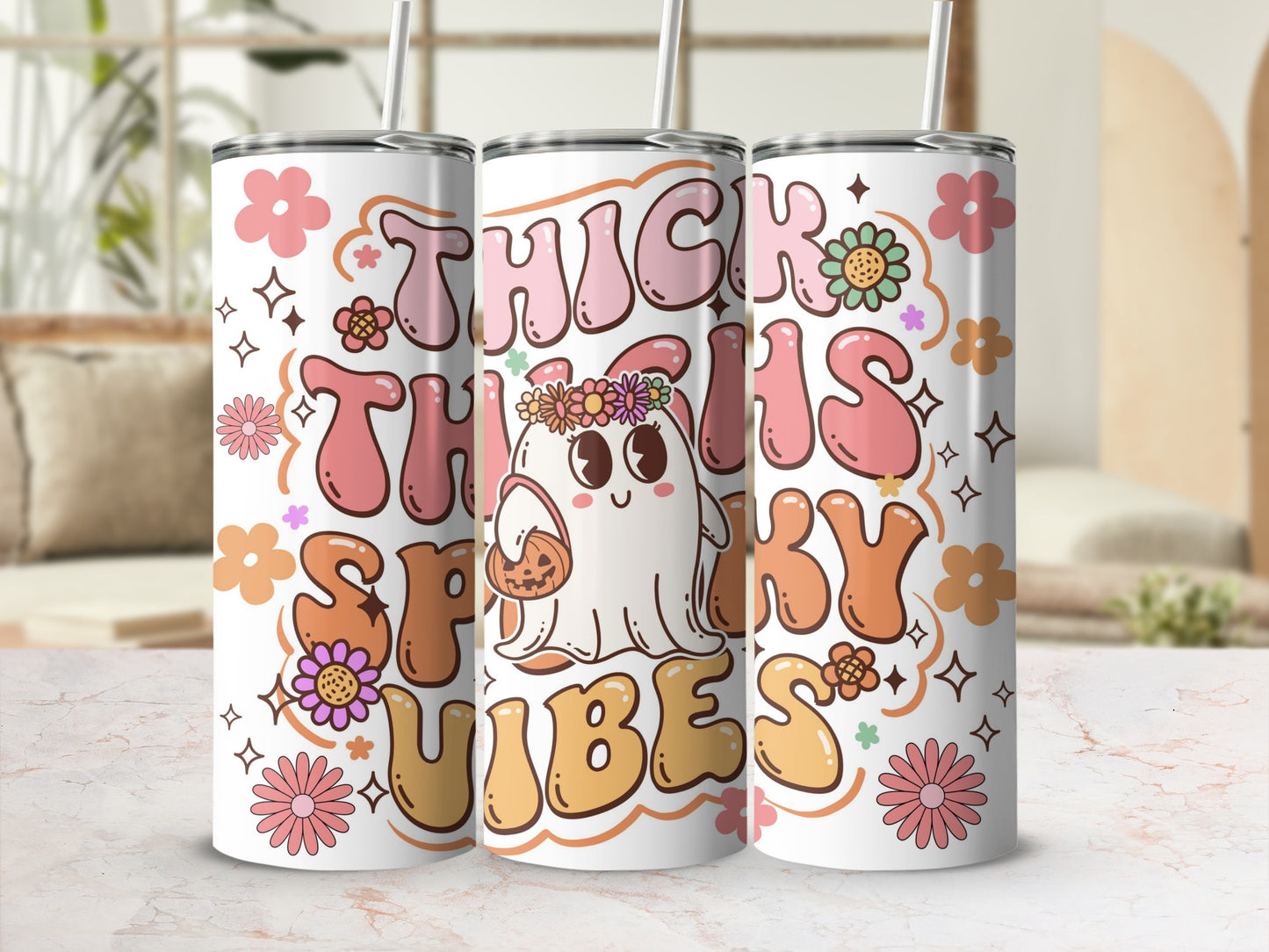 Three tumblers featuring a cute ghost and the text "Thick Thighs Spooky Vibes".