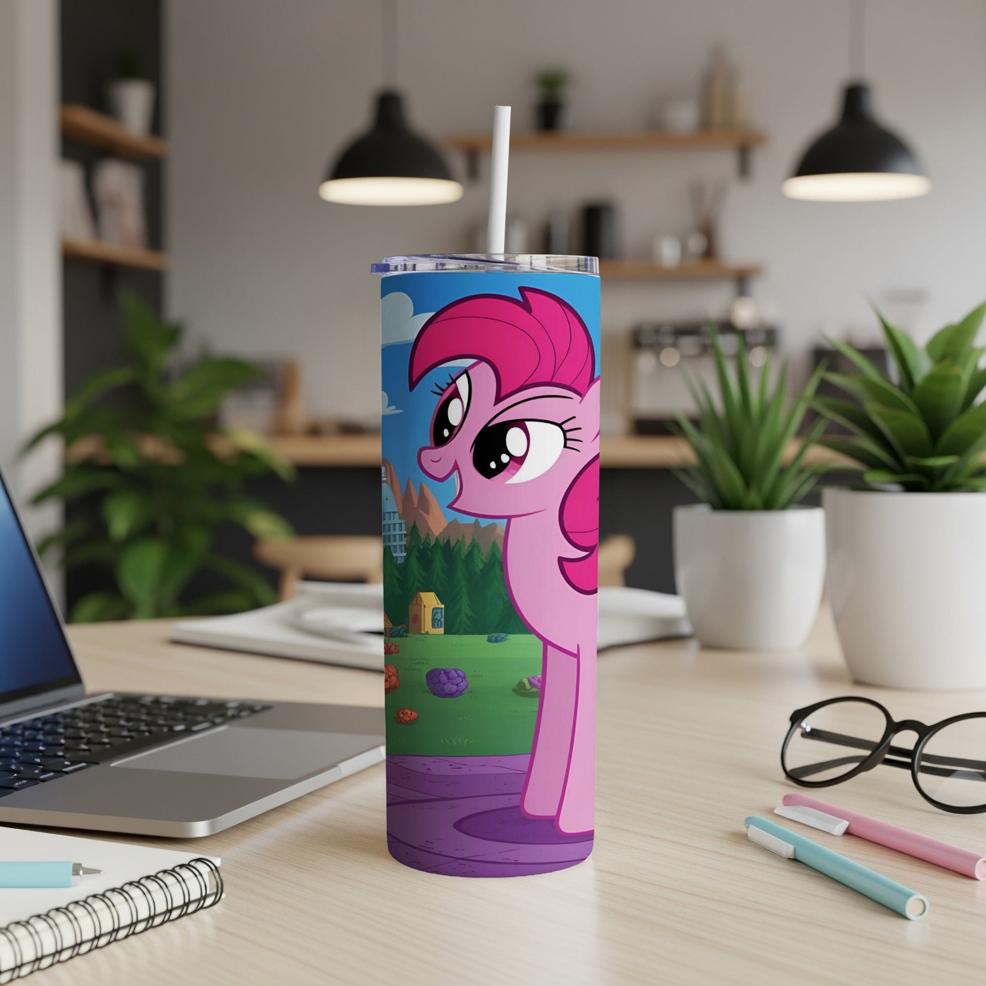 Pinkie Pie from My Little Pony on a skinny tumbler with a blue background.