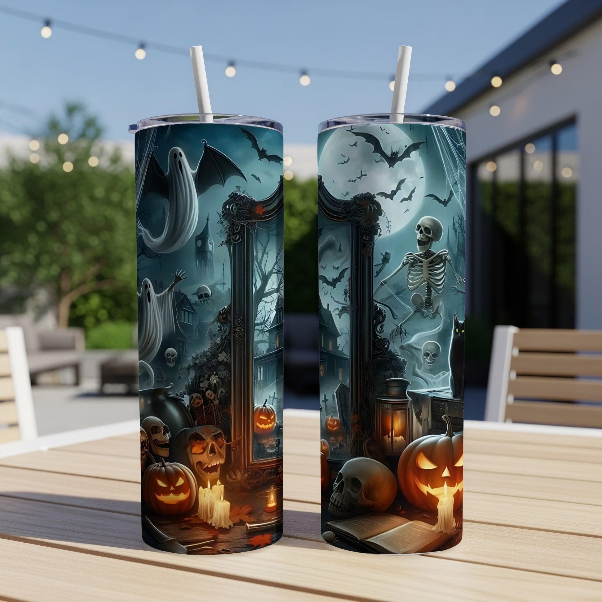 Two tumblers featuring a spooky Halloween scene with ghosts, bats, pumpkins, and skulls.