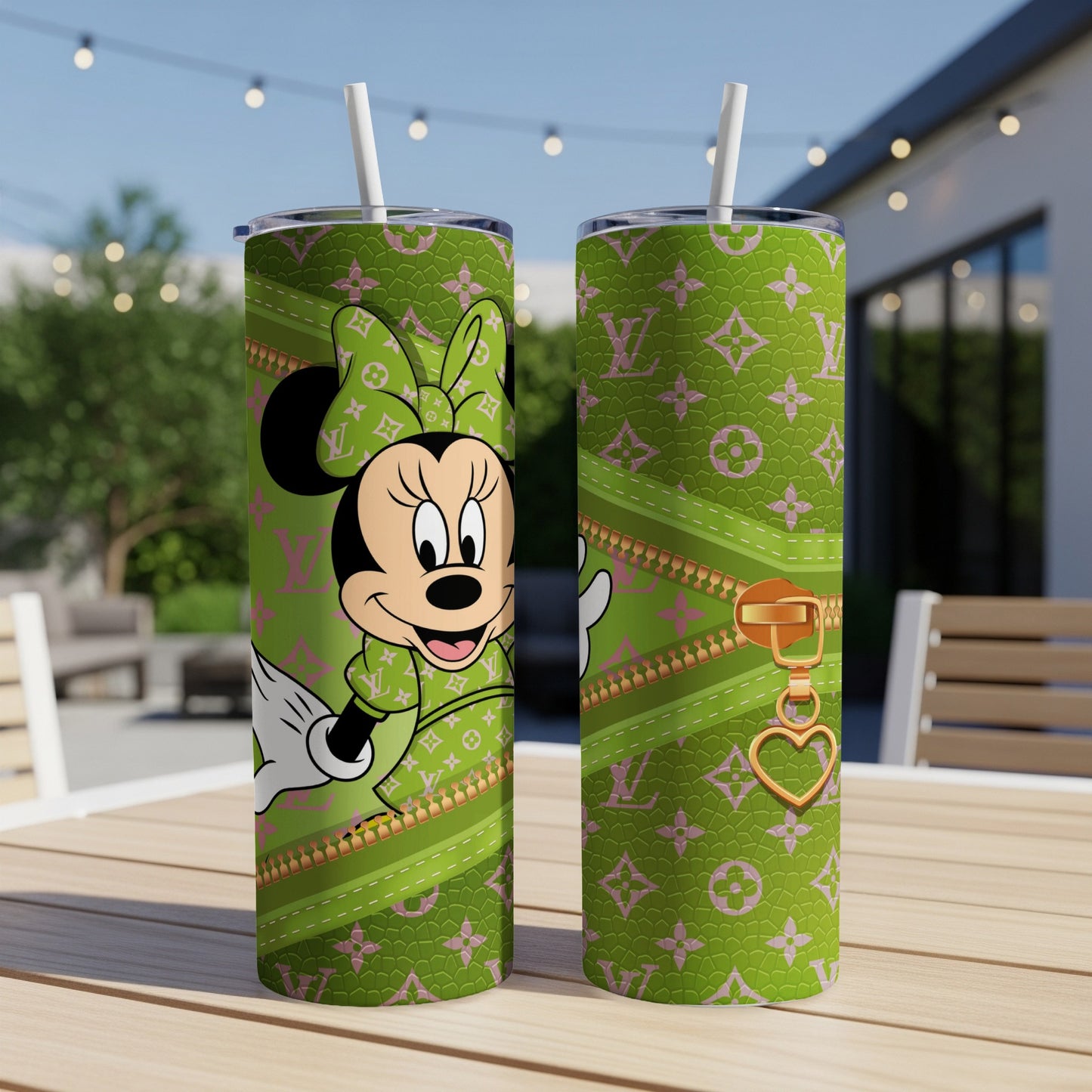 Green tumbler with Minnie Mouse and LV pattern, gold zipper detail.